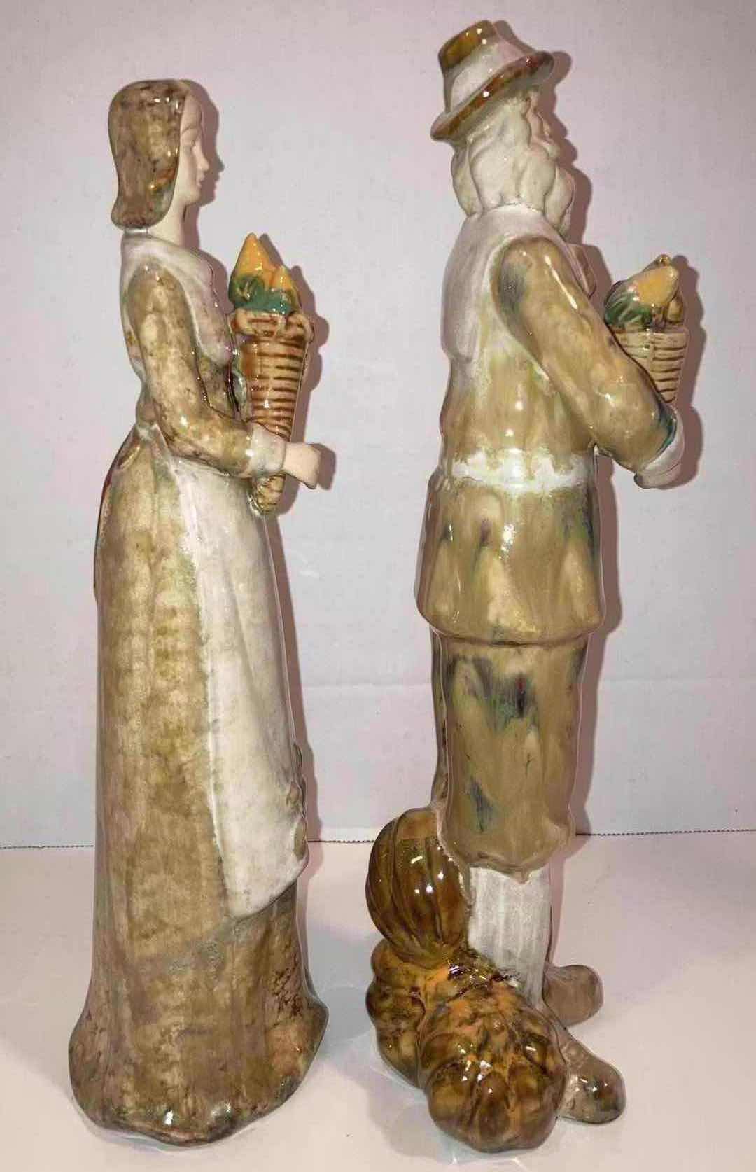 Photo 1 of AMISH WIFE & HUSBAND PUMPKIN FARMER PORCELAIN FIGURINES H12”