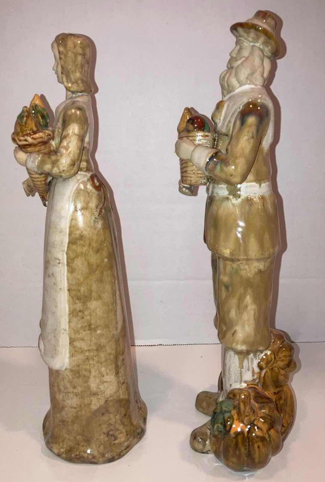 Photo 1 of AMISH WIFE & HUSBAND PUMPKIN FARMER PORCELAIN FIGURINES H12”