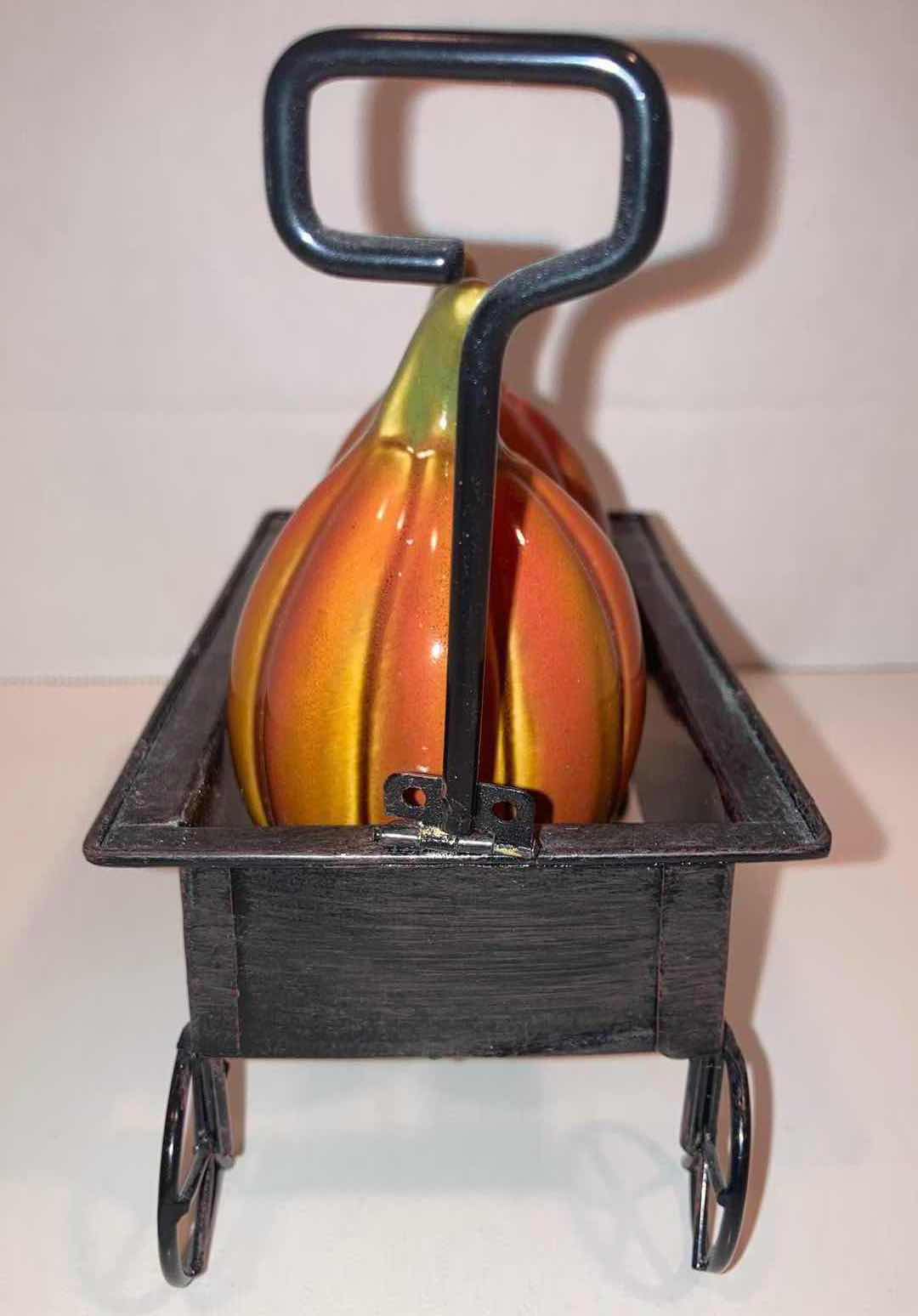 Photo 1 of CREATIVE CO-OP PUMPKIN WAGON SALT & PEPPER SHAKERS