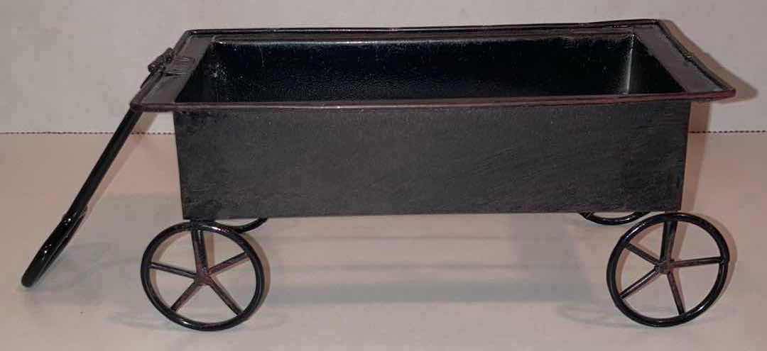 Photo 1 of CREATIVE CO-OP PUMPKIN WAGON SALT & PEPPER SHAKERS