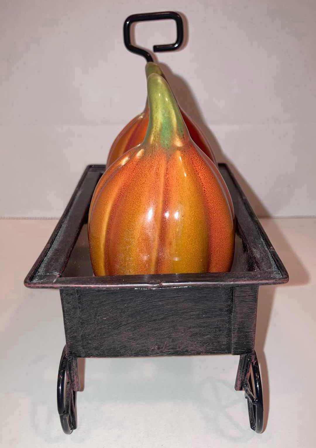 Photo 1 of CREATIVE CO-OP PUMPKIN WAGON SALT & PEPPER SHAKERS