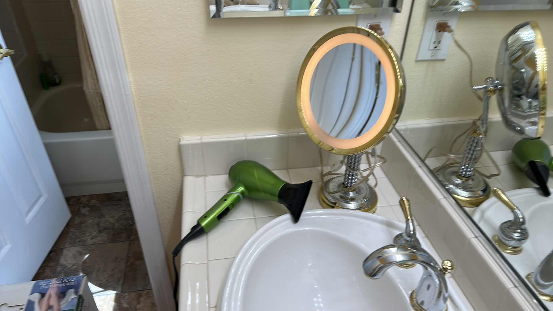 Photo 1 of CHROME AND BRASS LIGHTED MAGNIFYING MAKEUP MIRROR and CONAIR INFINITY PRO HAIR DRYER