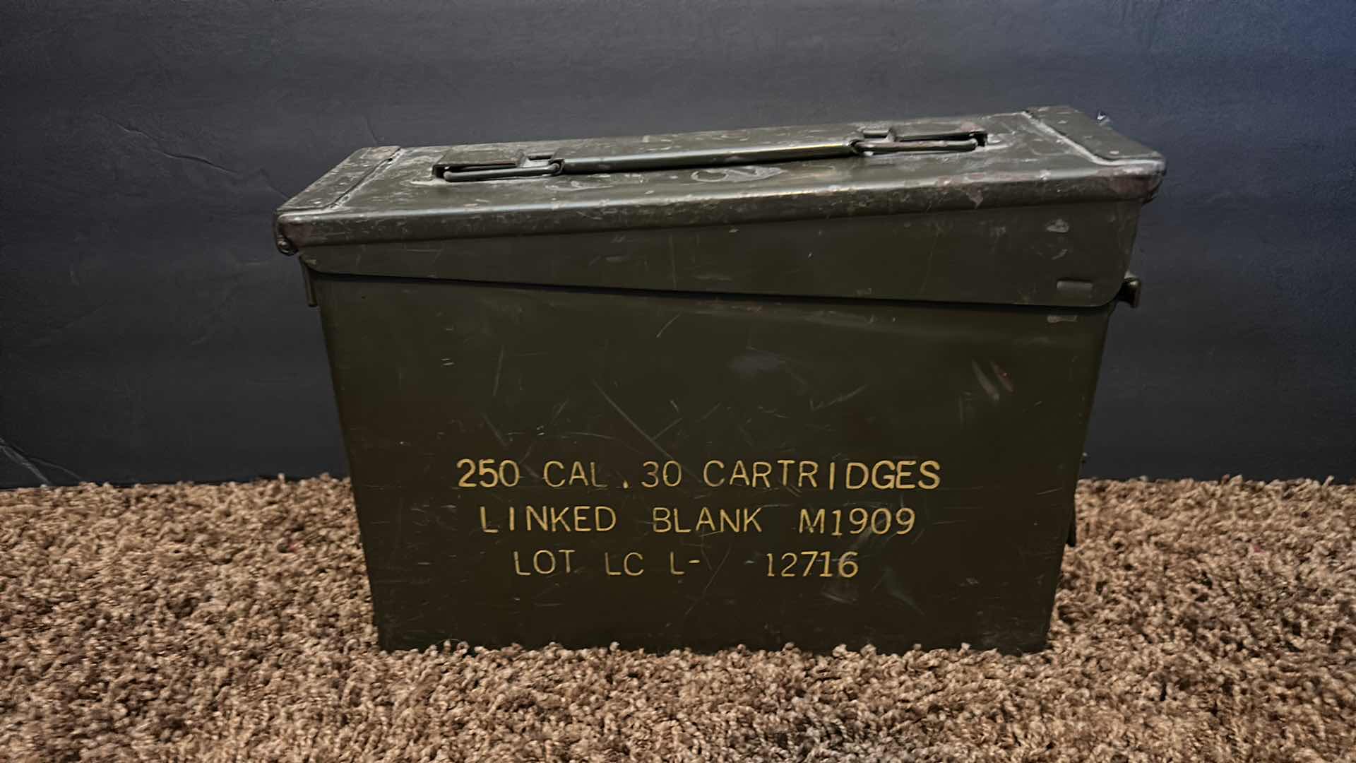 Photo 1 of GUN CLEANING KIT IN MILITARY GREEN METAL AMMUNITION CASE