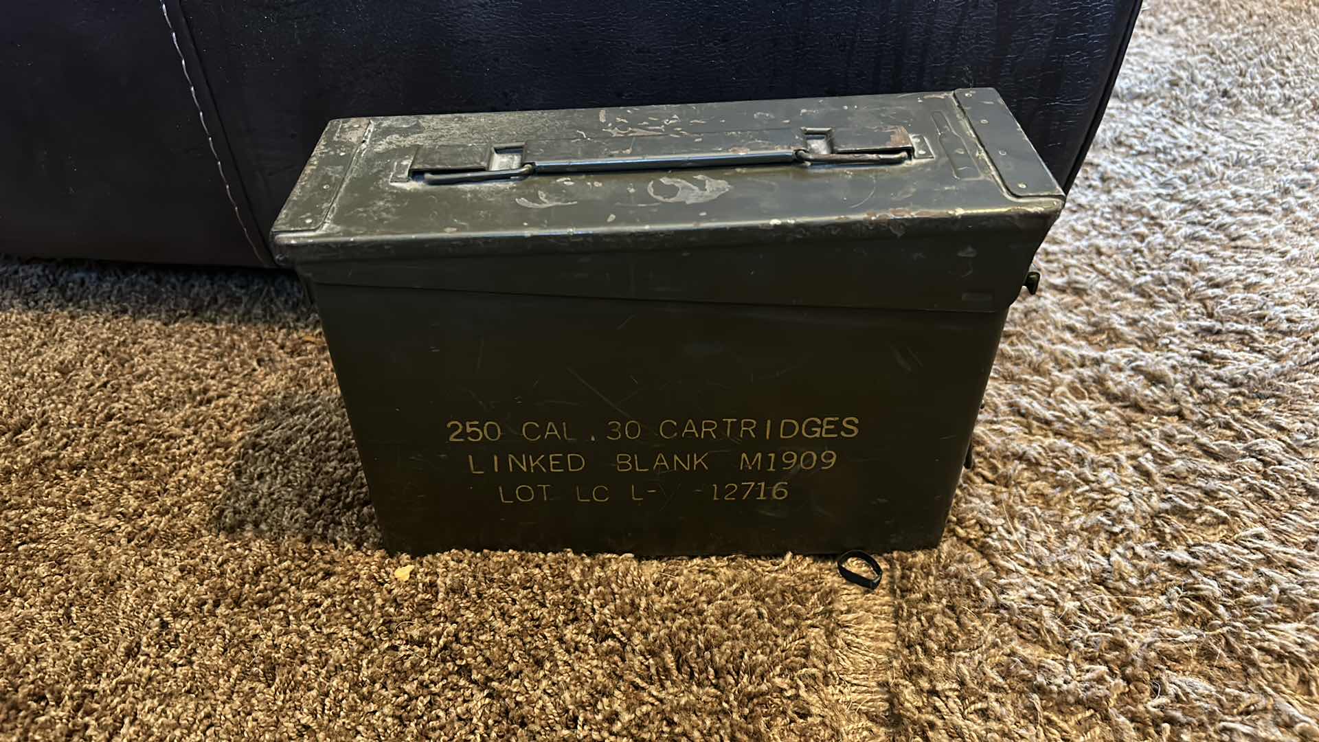 Photo 1 of GUN CLEANING KIT IN MILITARY GREEN METAL AMMUNITION CASE