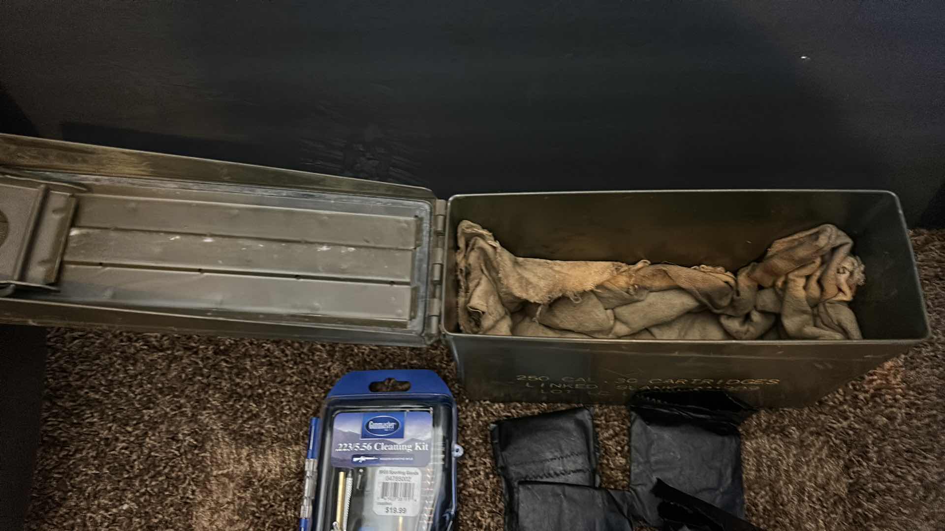 Photo 1 of GUN CLEANING KIT IN MILITARY GREEN METAL AMMUNITION CASE