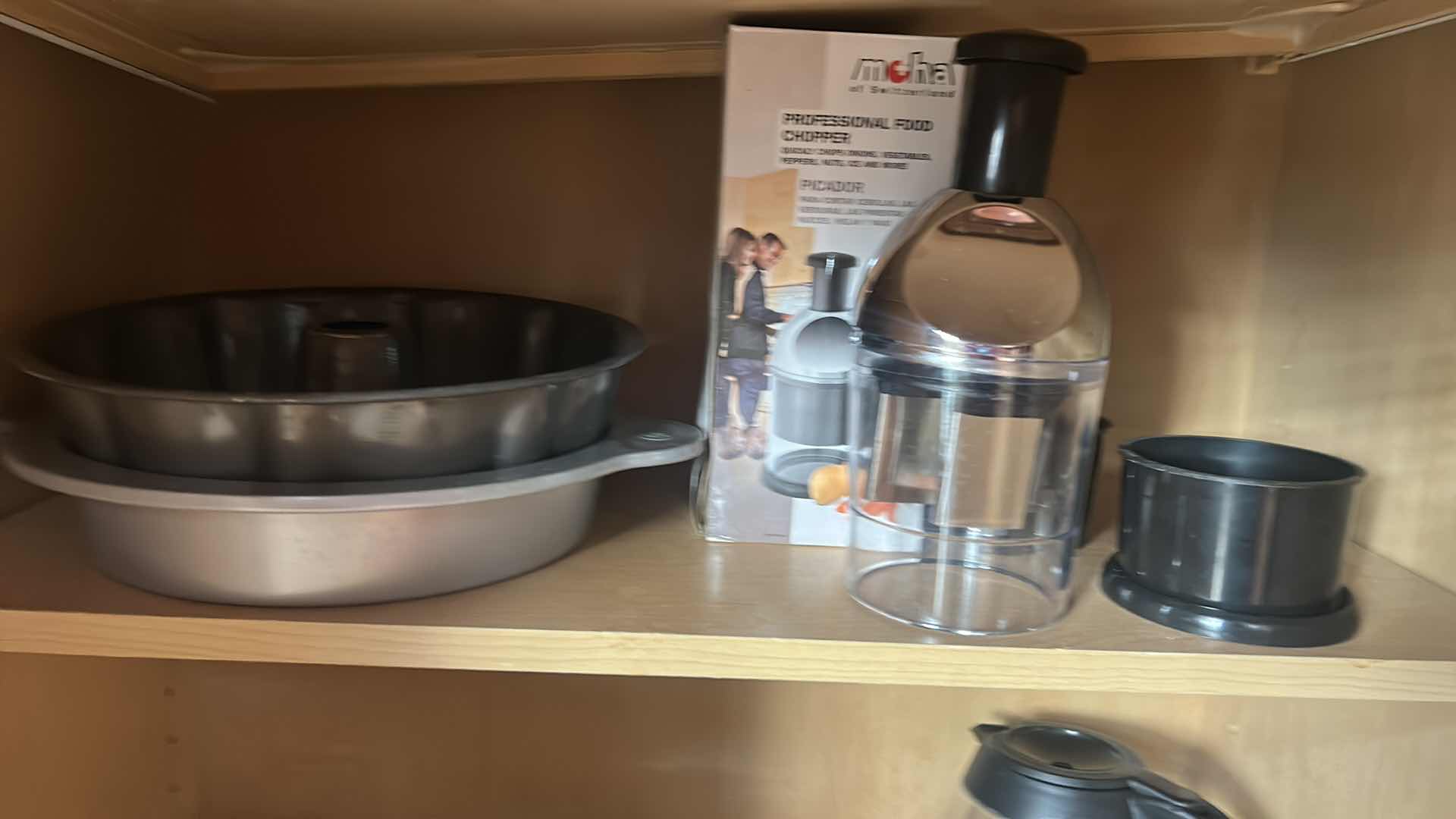 Photo 1 of CONTENTS OF KITCHEN CABINET