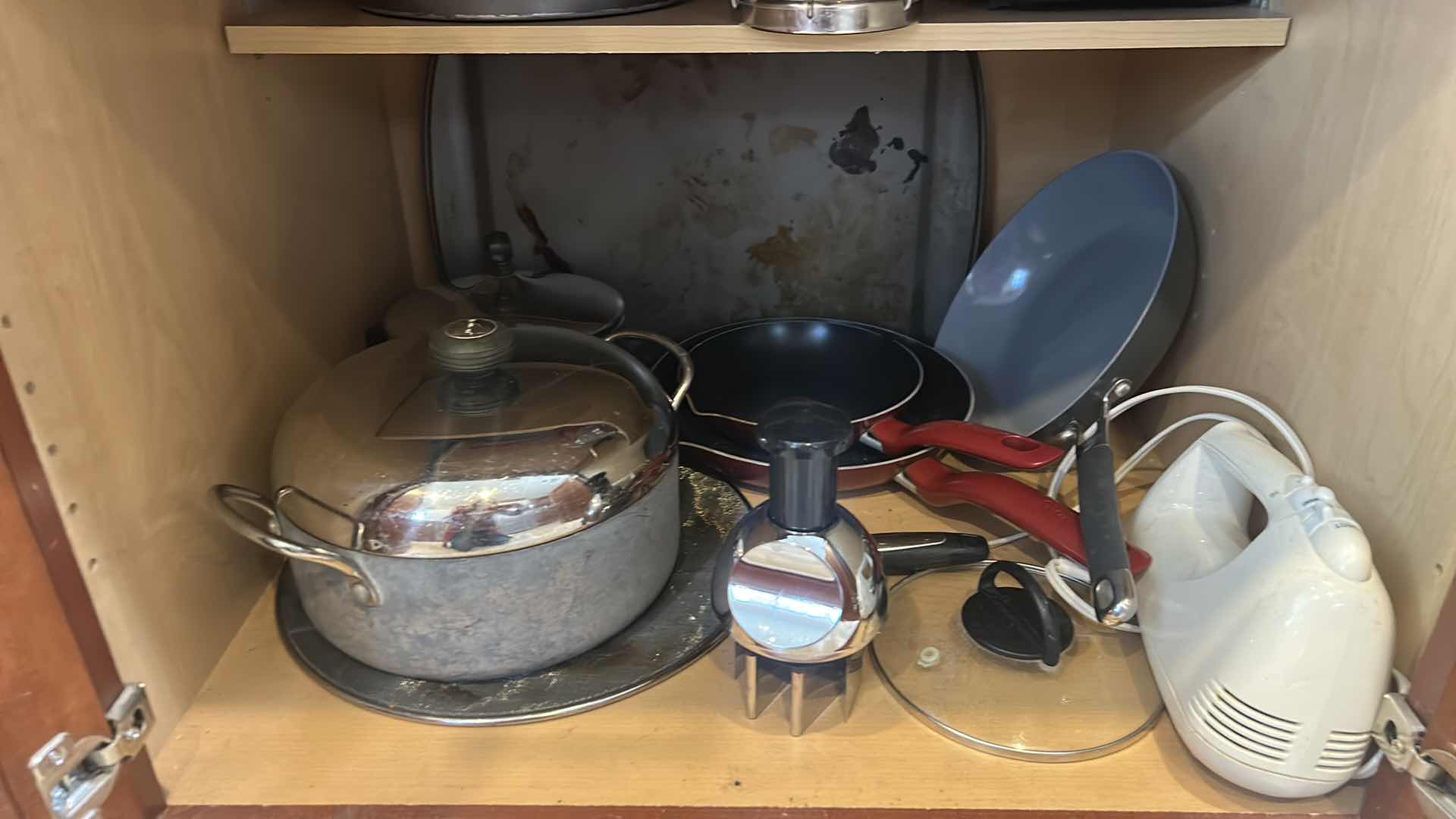 Photo 1 of CONTENTS OF KITCHEN CABINET