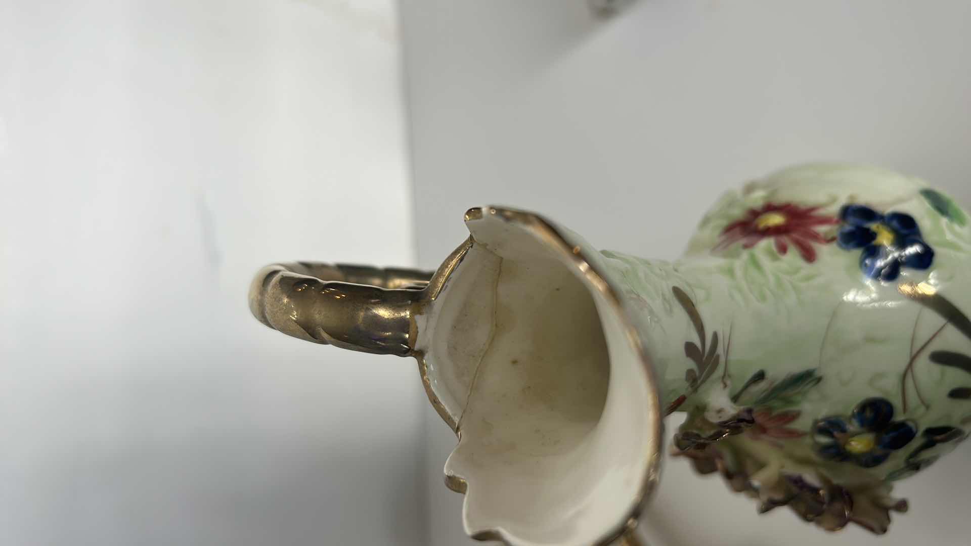 Photo 1 of TWO VINTAGE HANDPAINTED PORCELAIN PITCHERS/ VASES H 8 1/2”