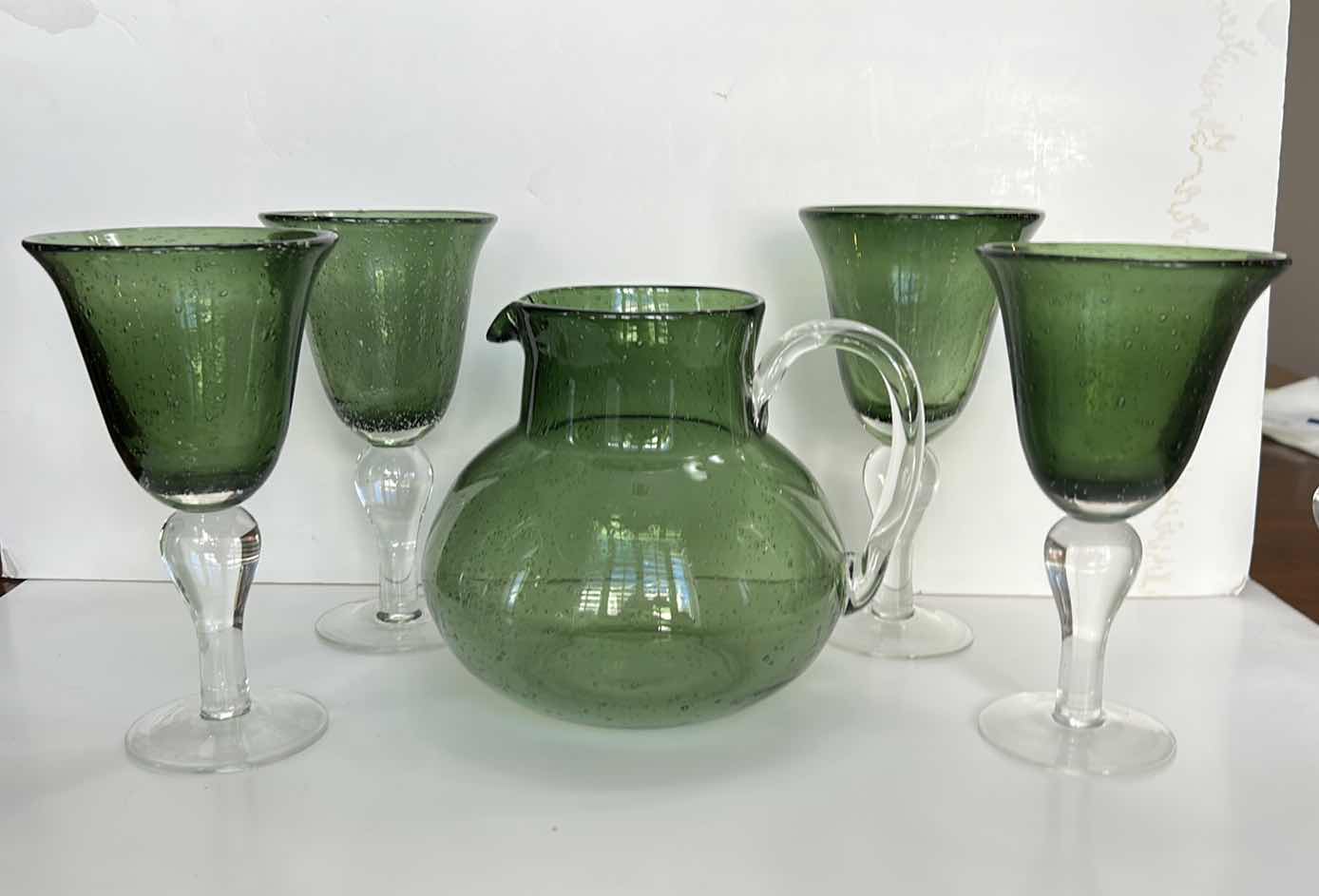 Photo 1 of GREEN SPECKLED GLASS PITCHER WITH 4 STEMMED GLASSES