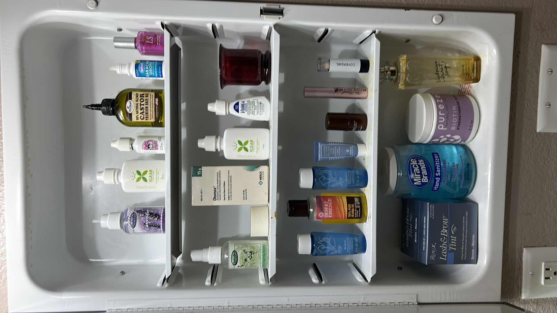 Photo 1 of CONTENTS OF CABINET IN BATHROOM
