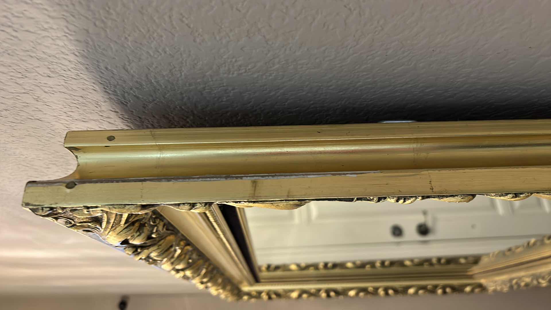 Photo 1 of ORNATE GOLD FRAMED MIRROR WITH BLACK VELVET 43” x 31 1/2”