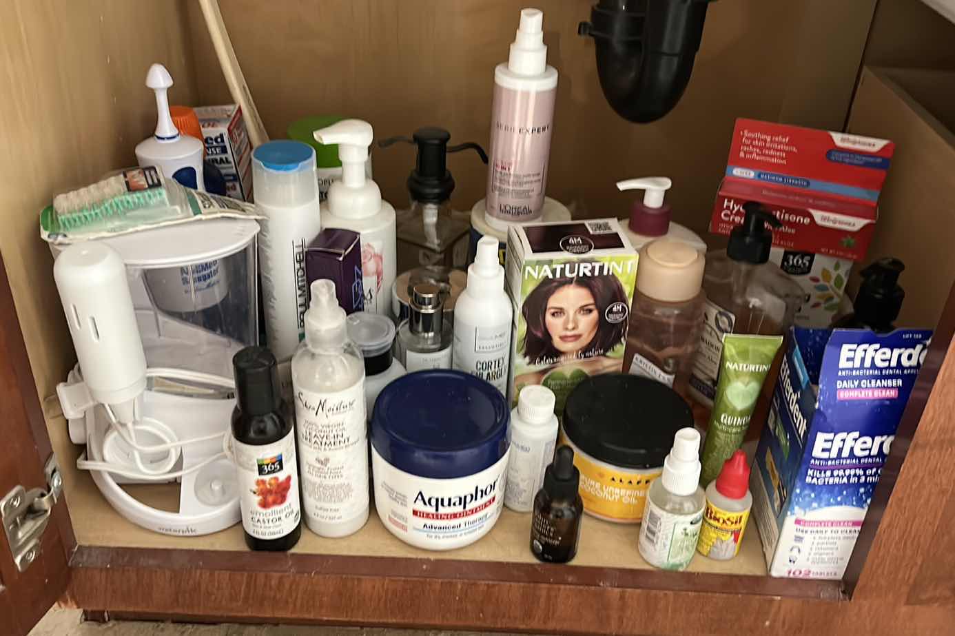 Photo 1 of CONTENTS OF CABINET IN MASTER BATHROOM