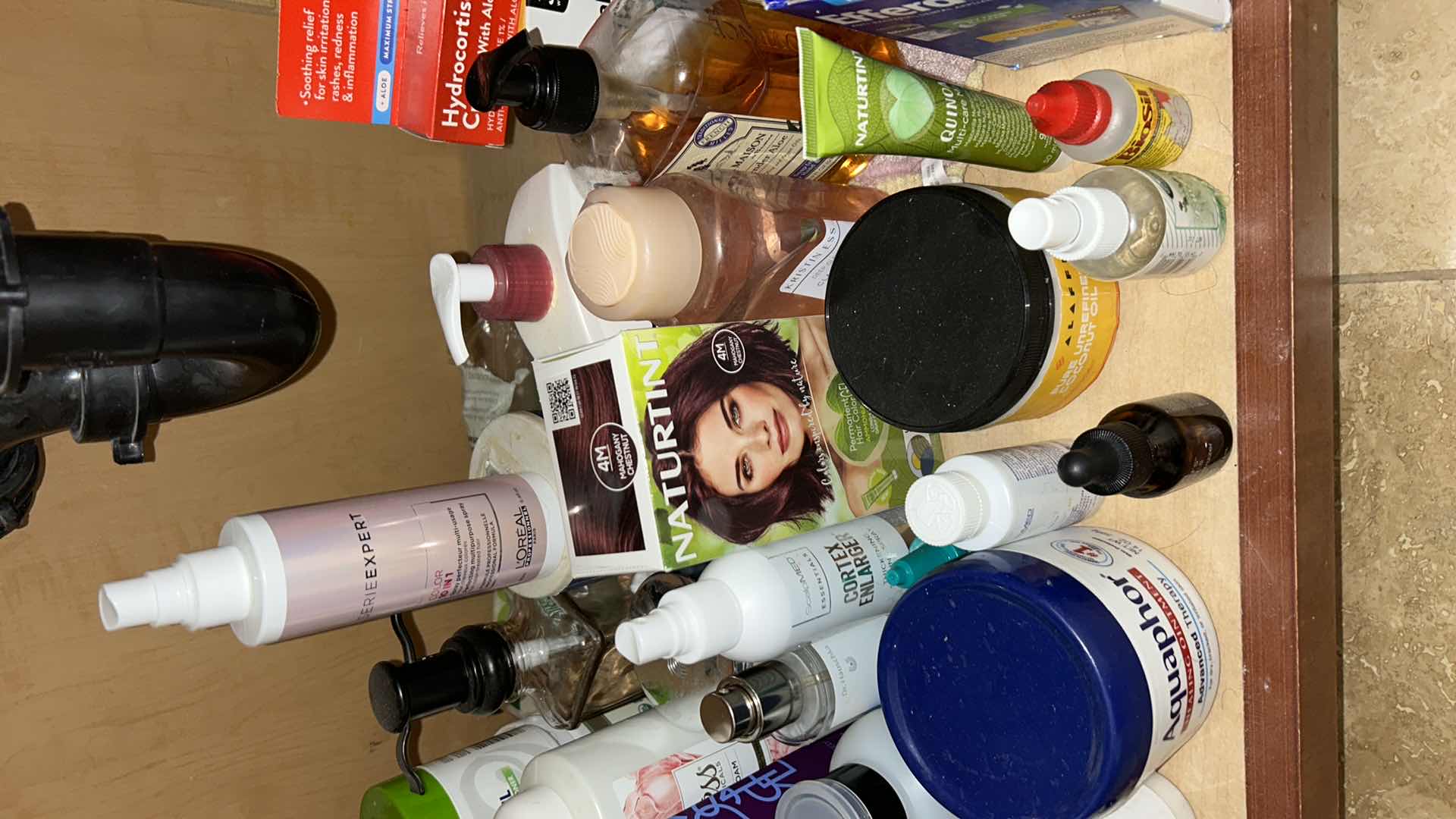 Photo 1 of CONTENTS OF CABINET IN MASTER BATHROOM