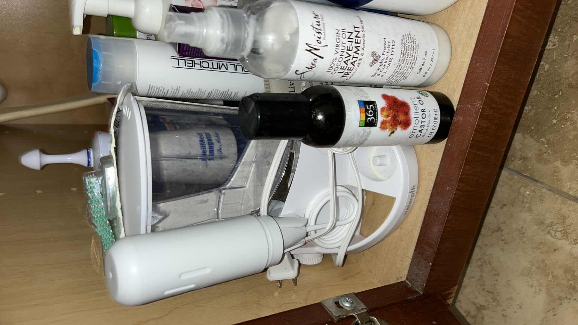 Photo 1 of CONTENTS OF CABINET IN MASTER BATHROOM