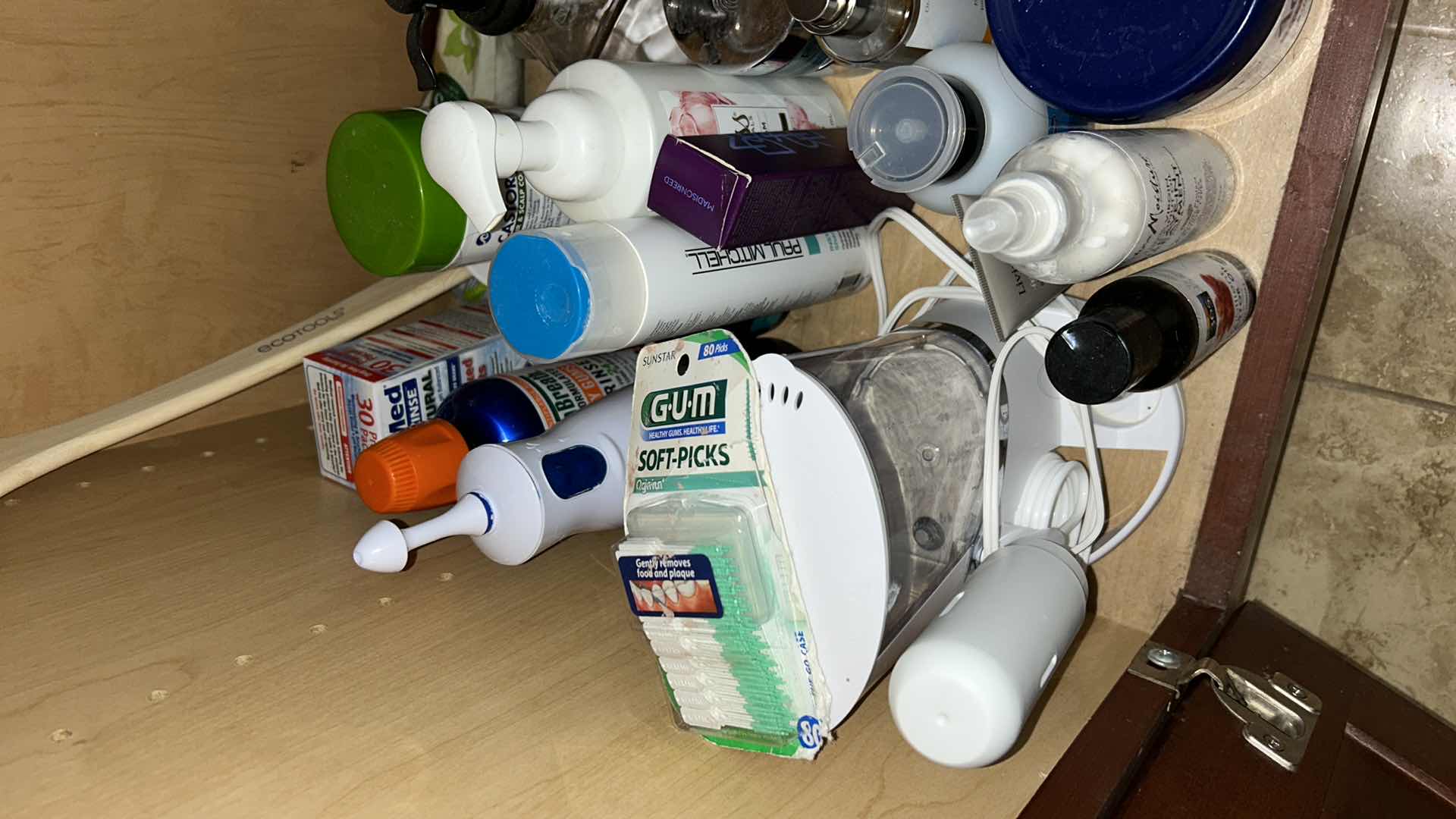 Photo 1 of CONTENTS OF CABINET IN MASTER BATHROOM