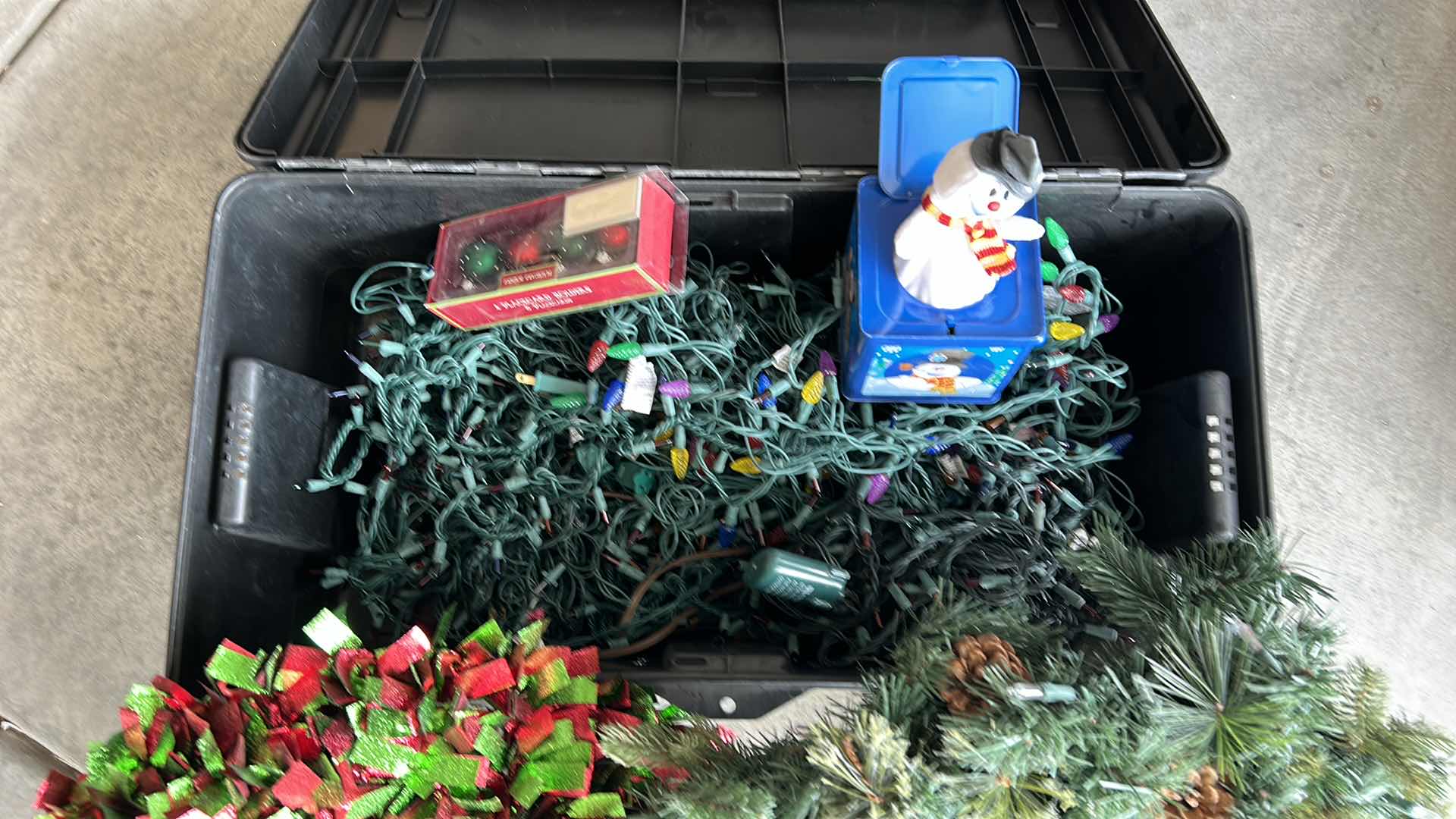 Photo 1 of TOTE FULL OF CHRISTMAS LIGHTS, AND TWO WREATHS