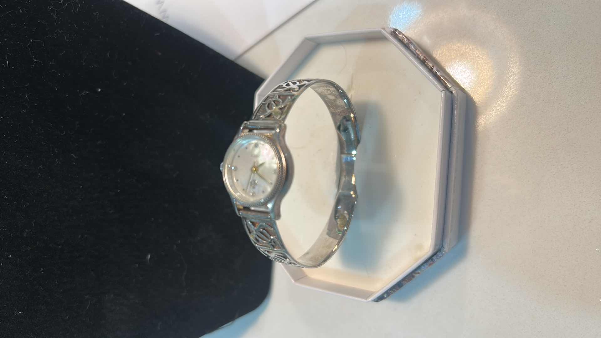 Photo 1 of FINE JEWELRY- STERLING SILVER BAND MOTHER OF PEARL FACE WOMENS SWISS MADE QUARTZ WATCH