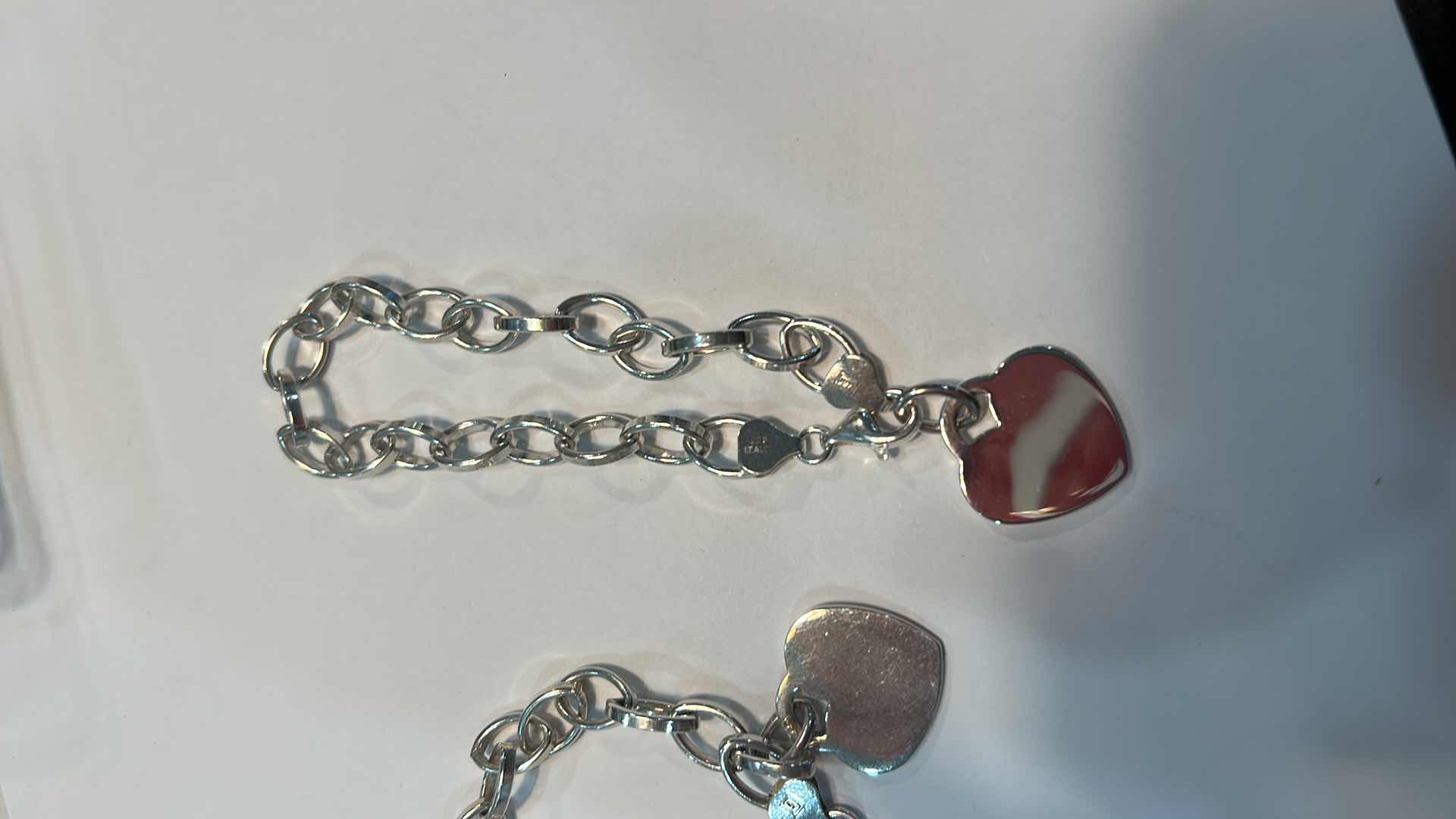 Photo 1 of FINE JEWELRY- 2 .925 STERLING SILVER MADE IN ITALY BRACELETS WITH HEART PENDANTS