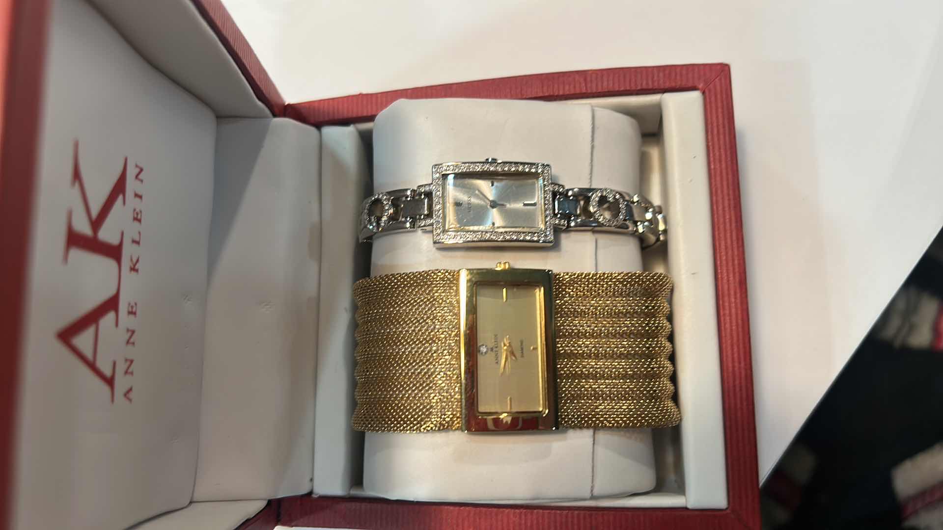 Photo 1 of TWO WOMENS WATCHES- GOLD ANNE KLEIN AND SILVER GUESS (NEEDS BATTERIES)