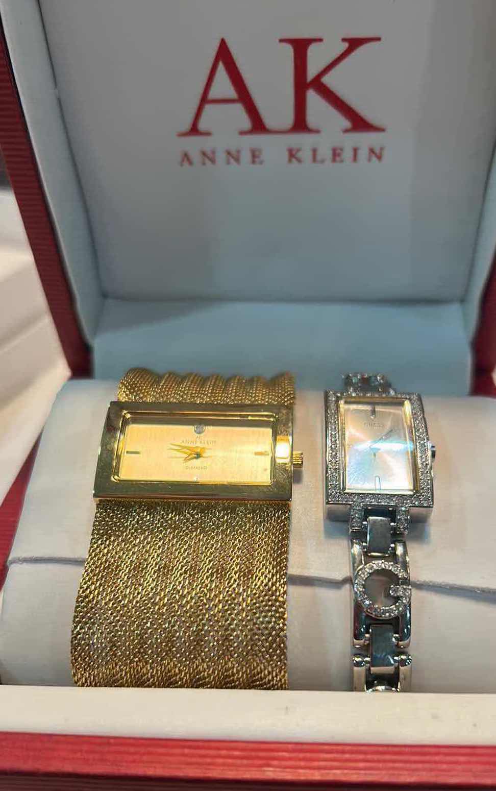 Photo 1 of TWO WOMENS WATCHES- GOLD ANNE KLEIN AND SILVER GUESS (NEEDS BATTERIES)