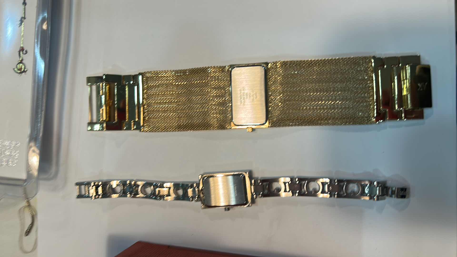 Photo 1 of TWO WOMENS WATCHES- GOLD ANNE KLEIN AND SILVER GUESS (NEEDS BATTERIES)