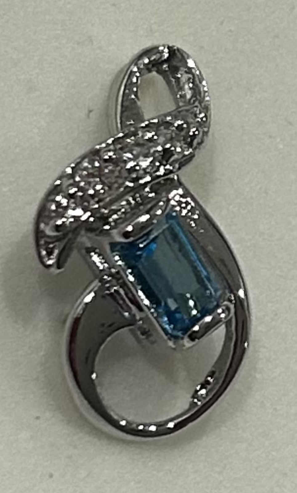 Photo 1 of FINE JEWELRY- .925 STERLING SMALL SILVER PENDANT WITH BLUE TOPAZ
