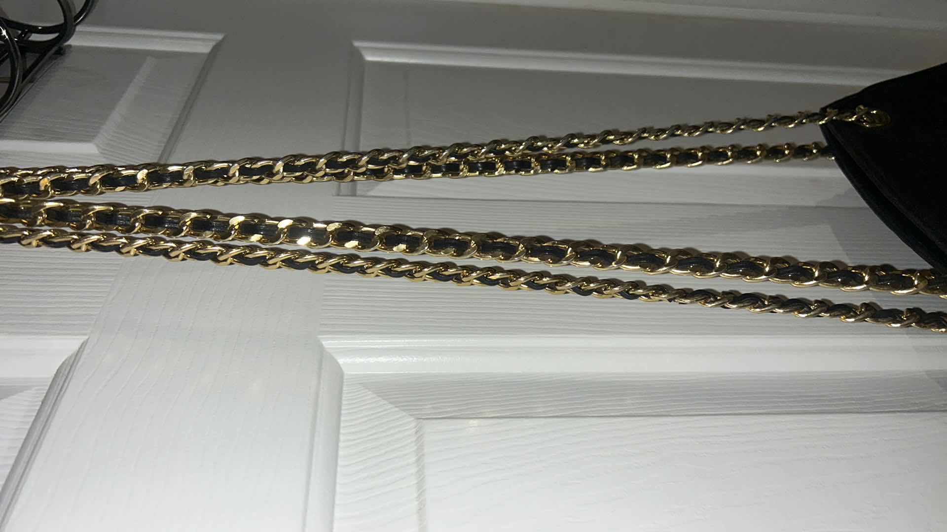 Photo 1 of BLACK PURSE WITH GOLD CHAIN