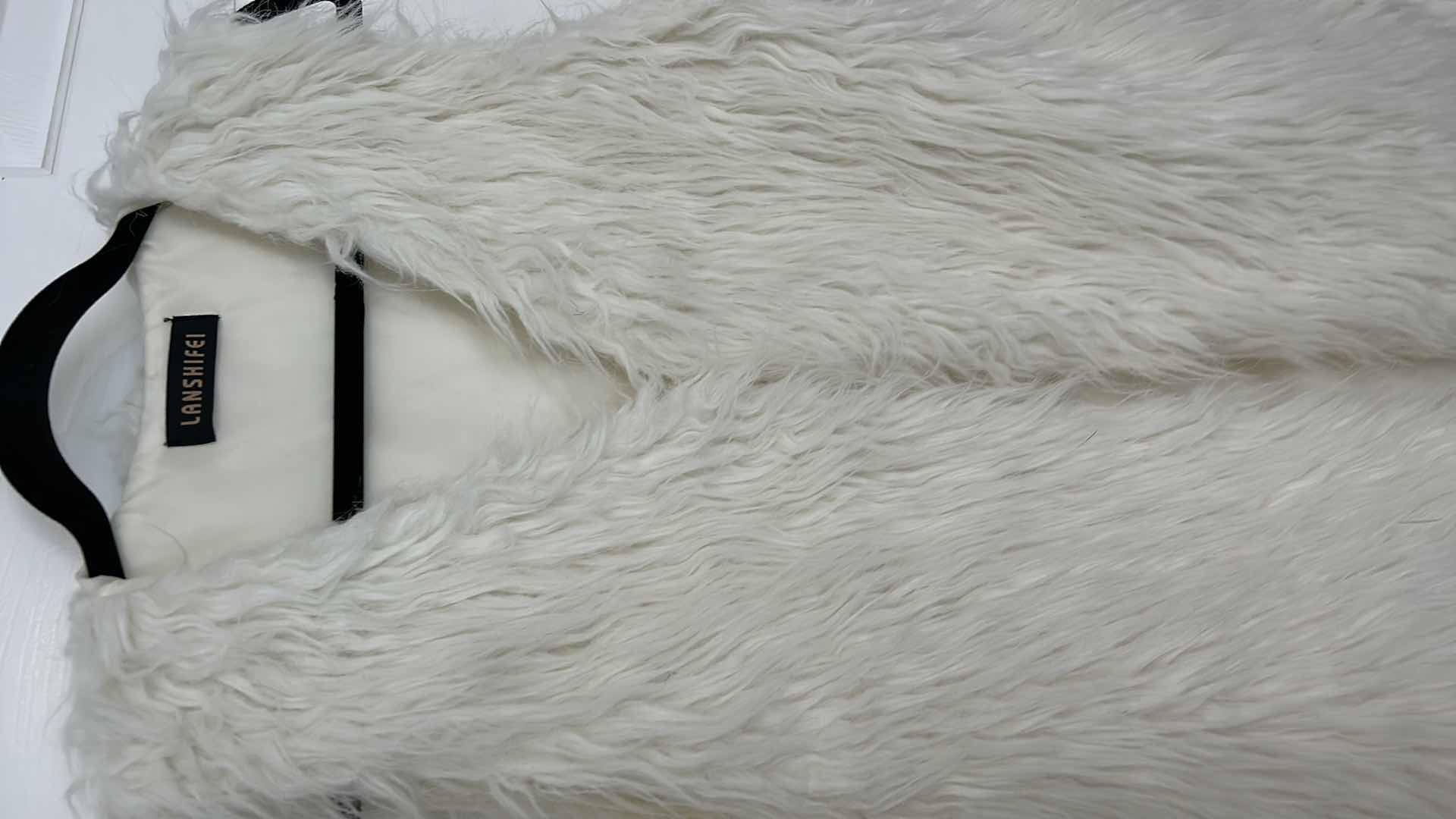 Photo 1 of WOMENSWEAR- WHITE FAUX FUR VEST SIZE MED