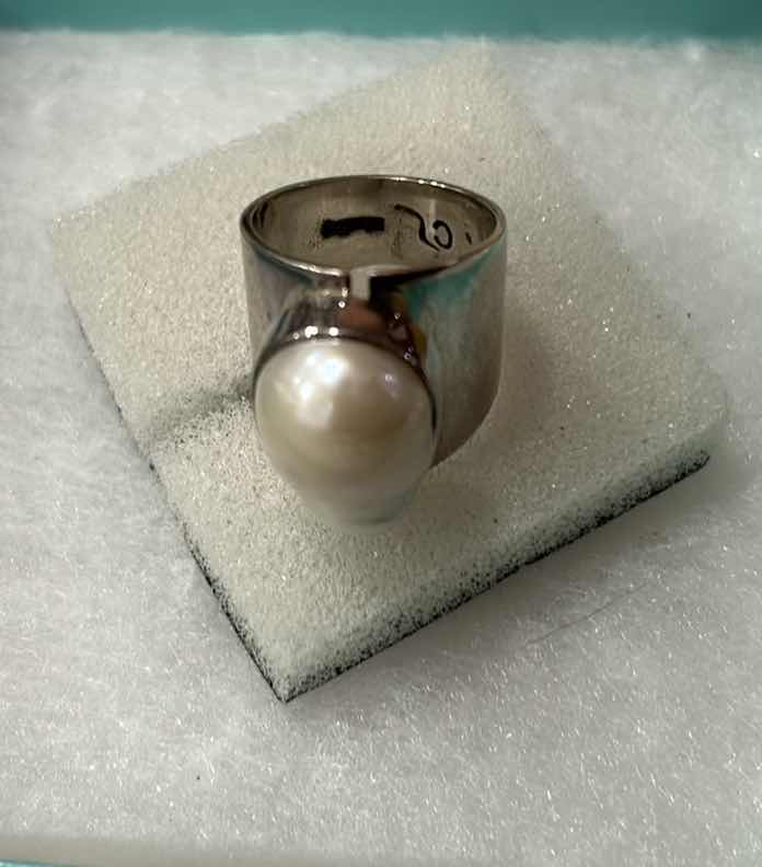 Photo 1 of COSTUME JEWELRY - CL STERLING SILVER RING JUST UNDER 1” LONG, WITH LARGE FRESH WATER PEARL SIZE 7.5