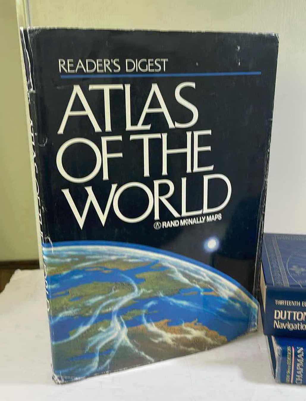 Photo 1 of NAVIGATION & PILOTING BOOKS WITH WORLD ATLAS