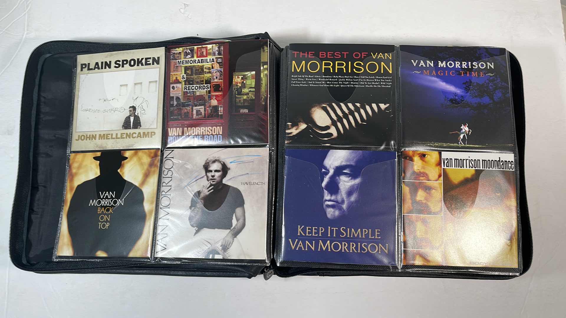 Photo 3 of ASSORTED MUSIC CDS & BODY GLOVE CARRY CASE