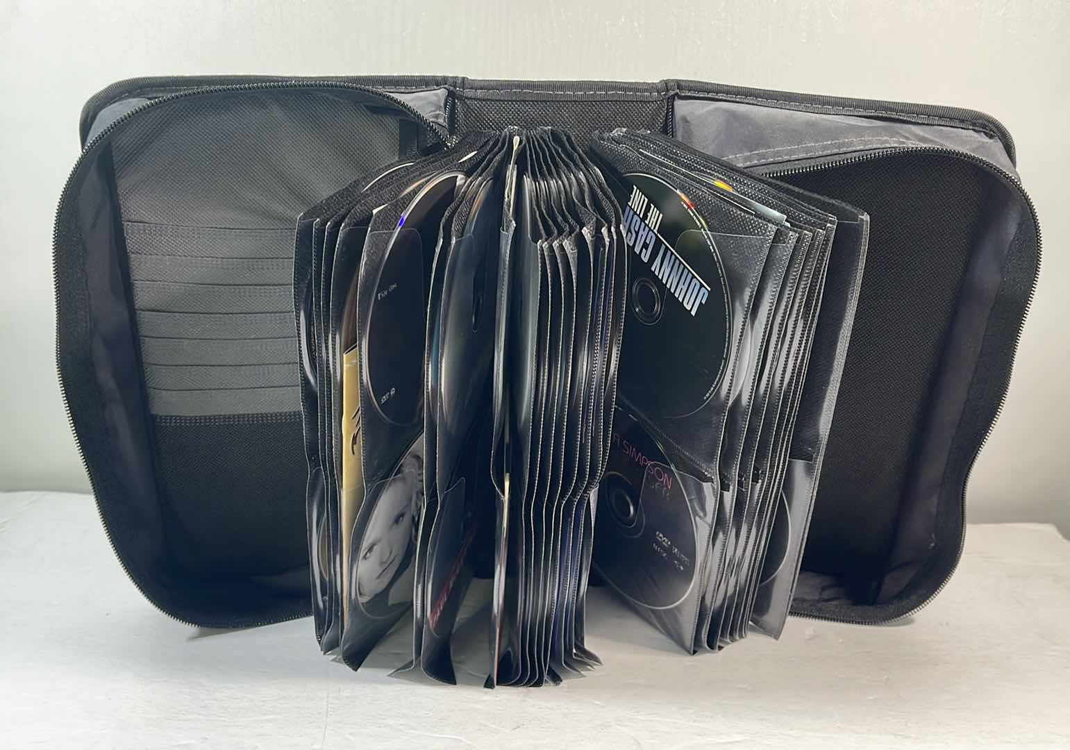 Photo 1 of CONCERT/VIDEO MUSIC CD/DVDS VARIOUS & CASE LOGIC CARRY CASE