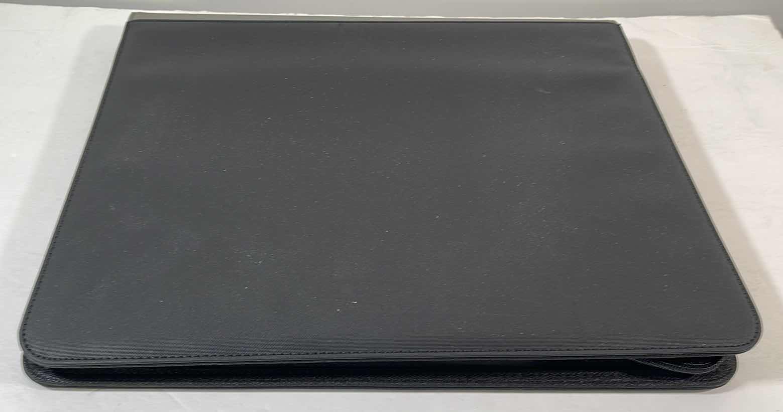 Photo 1 of ASSORTED SPORTS TRADING CARDS IN FOLDER CASE