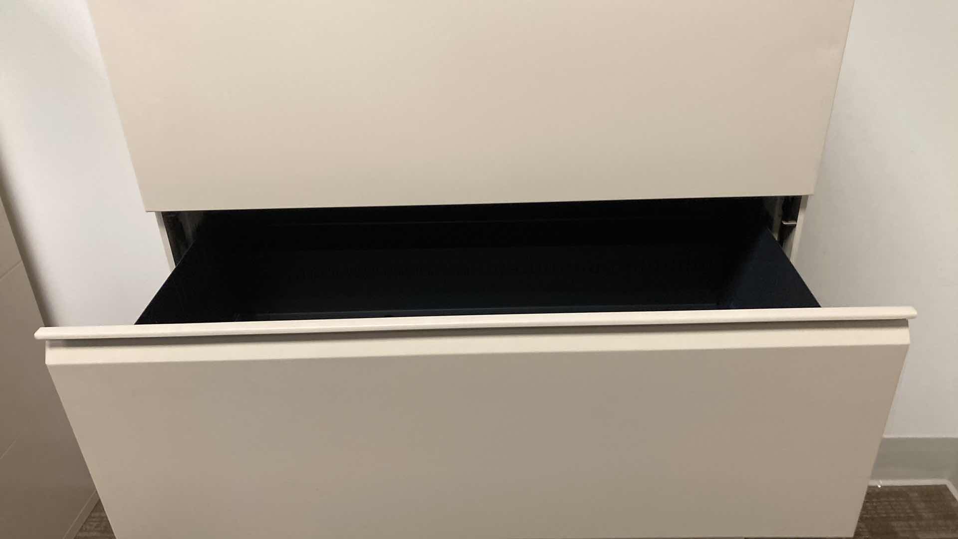 Photo 1 of HERMAN MILLER BEIGE 4 DRAWER LATERAL FILING CABINET 36” X 20” H55”