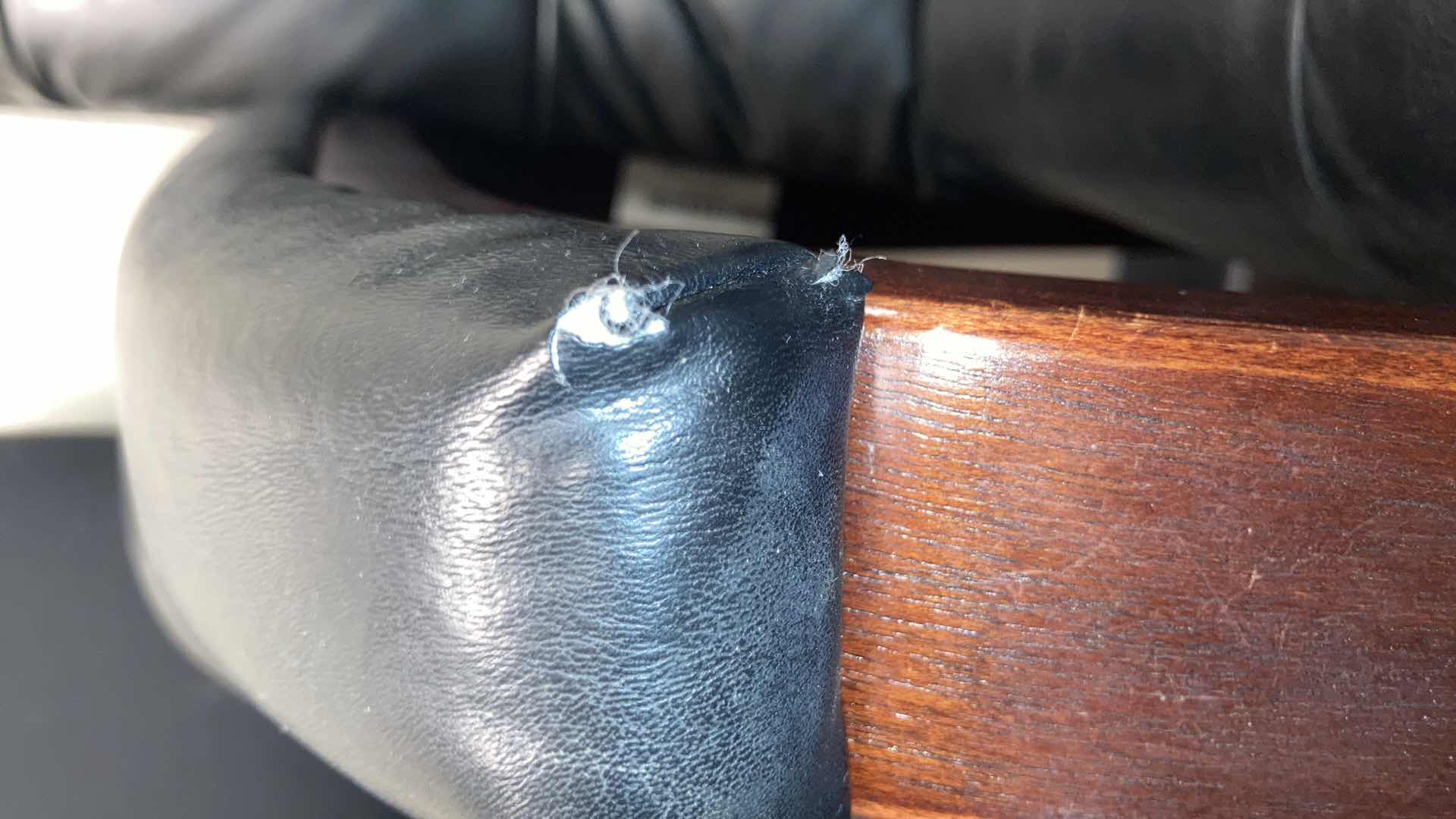 Photo 1 of LA-Z-BOY HORIZON BLACK VINYL CONFERENCE CHAIR W DARK CHERRY WOOD FINISH 24.5” X 26” X34”