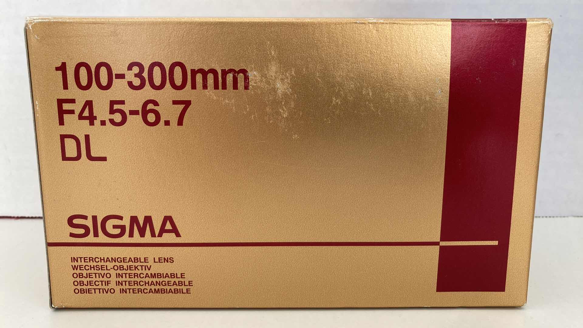 Photo 1 of SIGMA 100-300MM F4.5-6.7 DL AUTOFOCUS LENS (FOR NIKON)