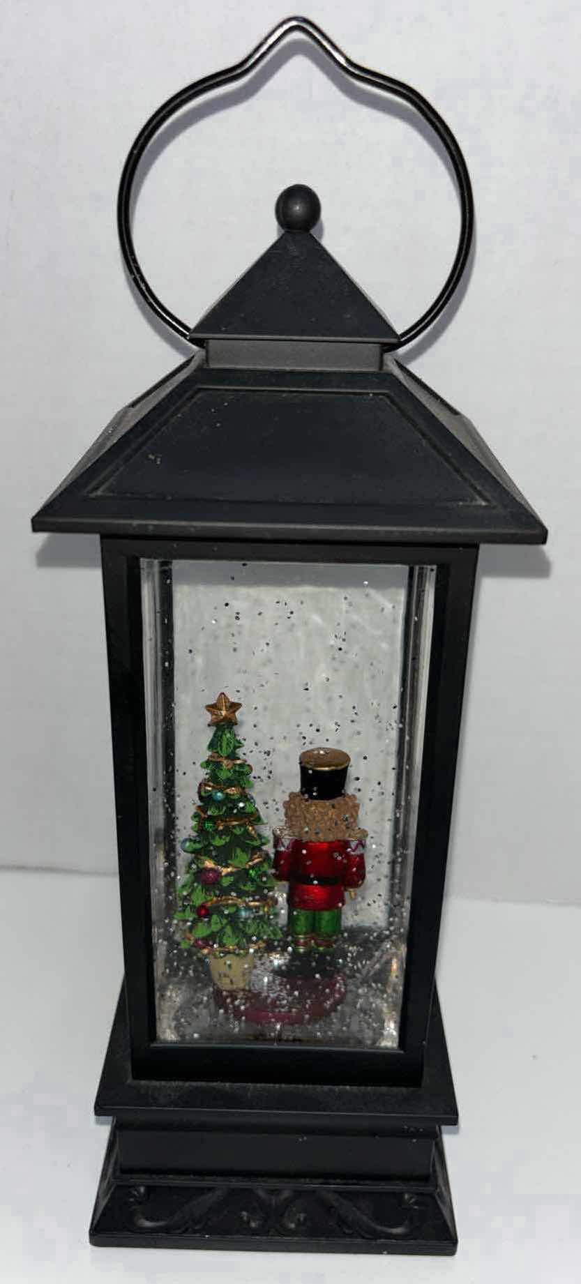 Photo 1 of BATTERY OPERATED 12” NUTCRACKER COLOR-CHANGING SNOWGLOBE LANTERN (3 X C BATTERIES)