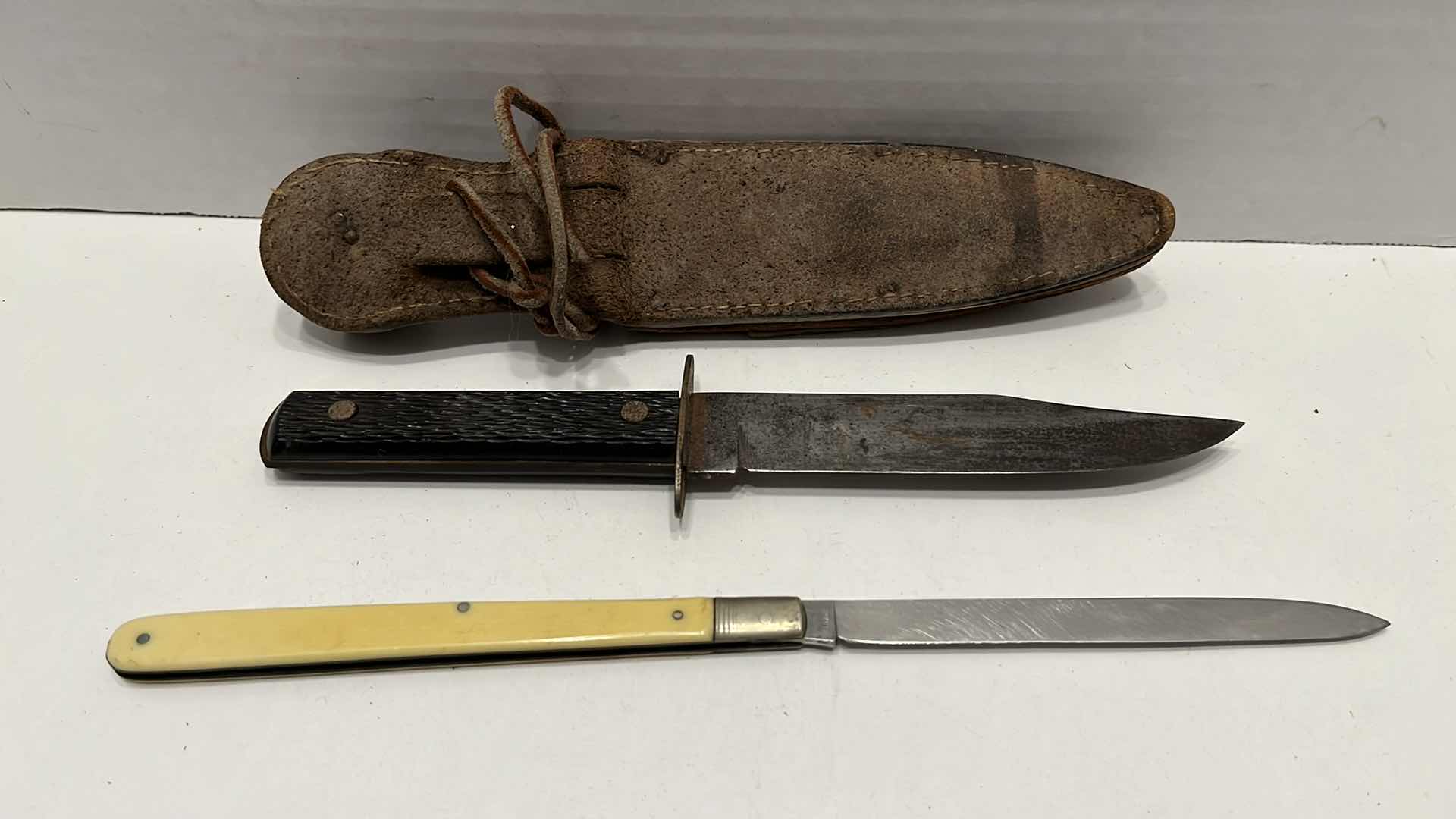 Photo 1 of IMPERIAL 9” FIXED BLADE KNIFE & AUG MULLER 10” FOLDING KNIFE W LEATHER DUAL SCABBARD