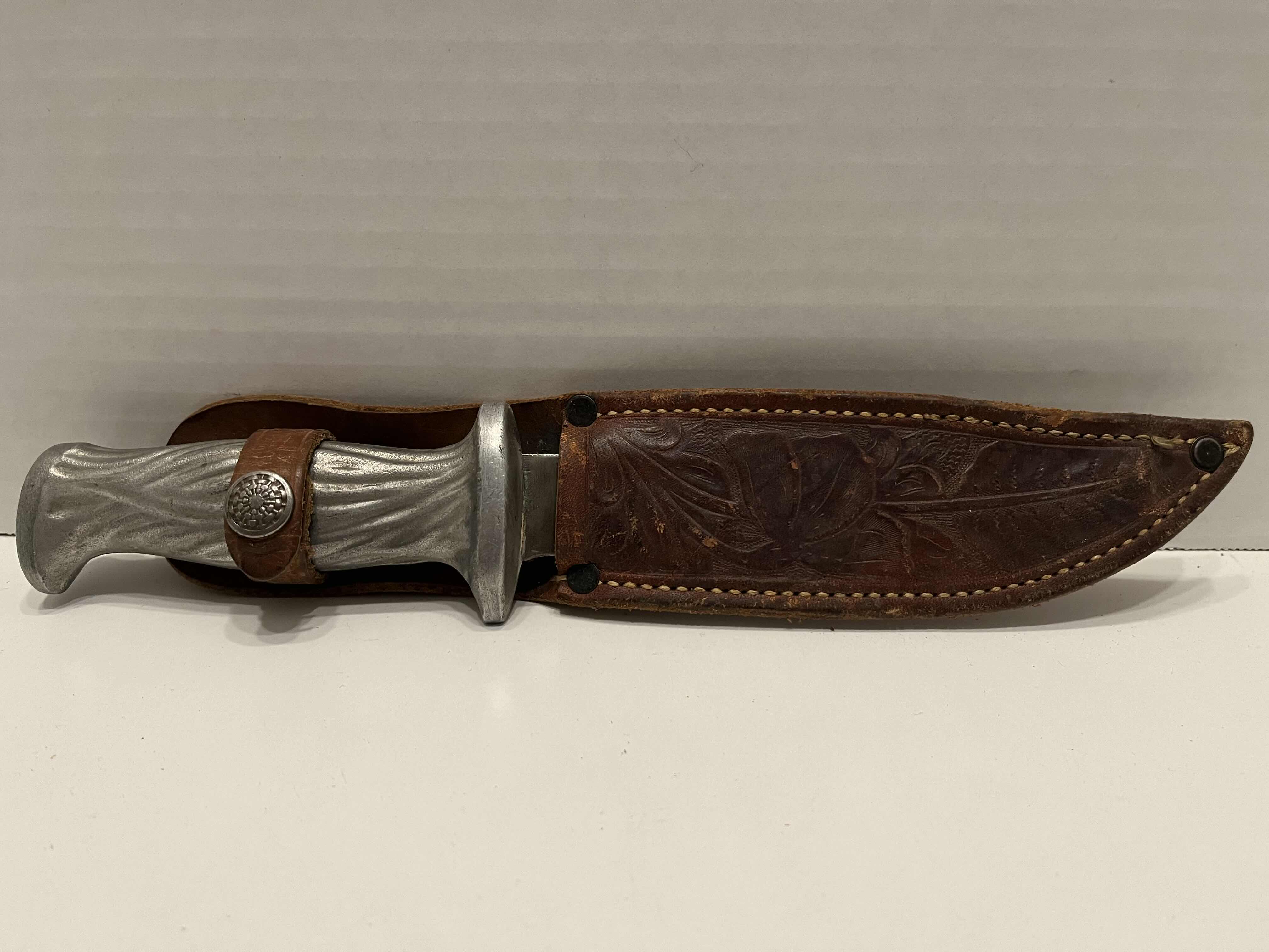 Photo 1 of ORIGINAL US WWII MURPHY CAST ALUMINUM HANDLE COMBAT FIGHTING KNIFE W LEATHER SCABBARD 2” X 11”