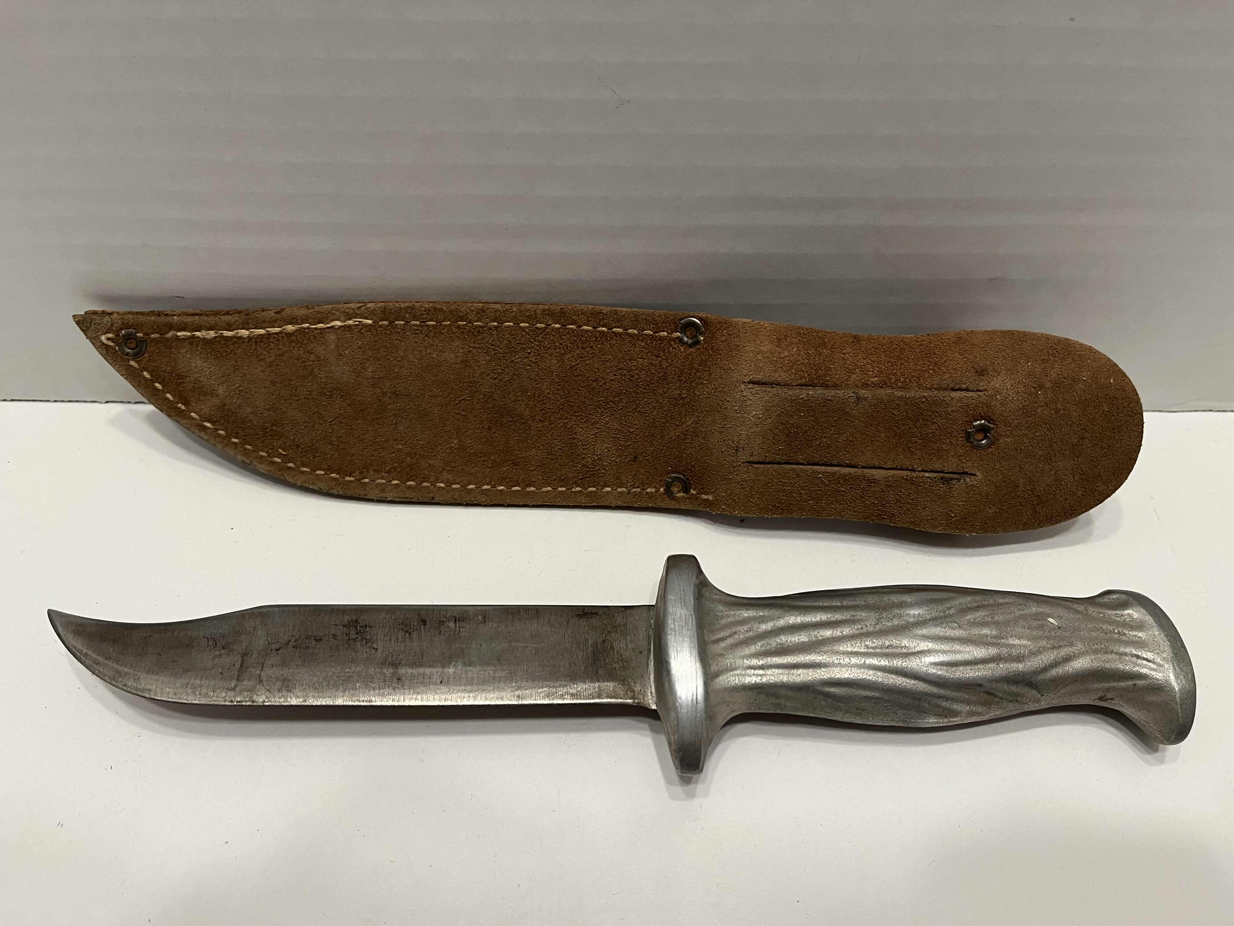 Photo 1 of ORIGINAL US WWII MURPHY CAST ALUMINUM HANDLE COMBAT FIGHTING KNIFE W LEATHER SCABBARD 2” X 11”