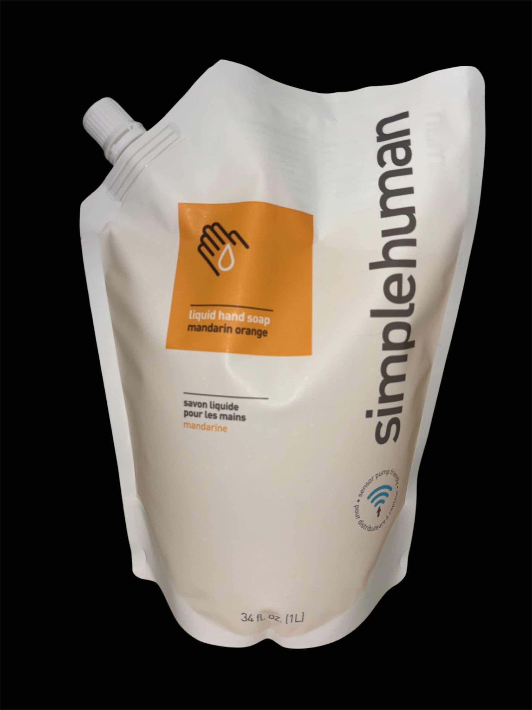 Photo 1 of NEW SIMPLE HUMAN LIQUID HAND SOAP REFILL POUCH FOR SENSOR PUMPS, MANDARIN ORANGE 34 OZ
