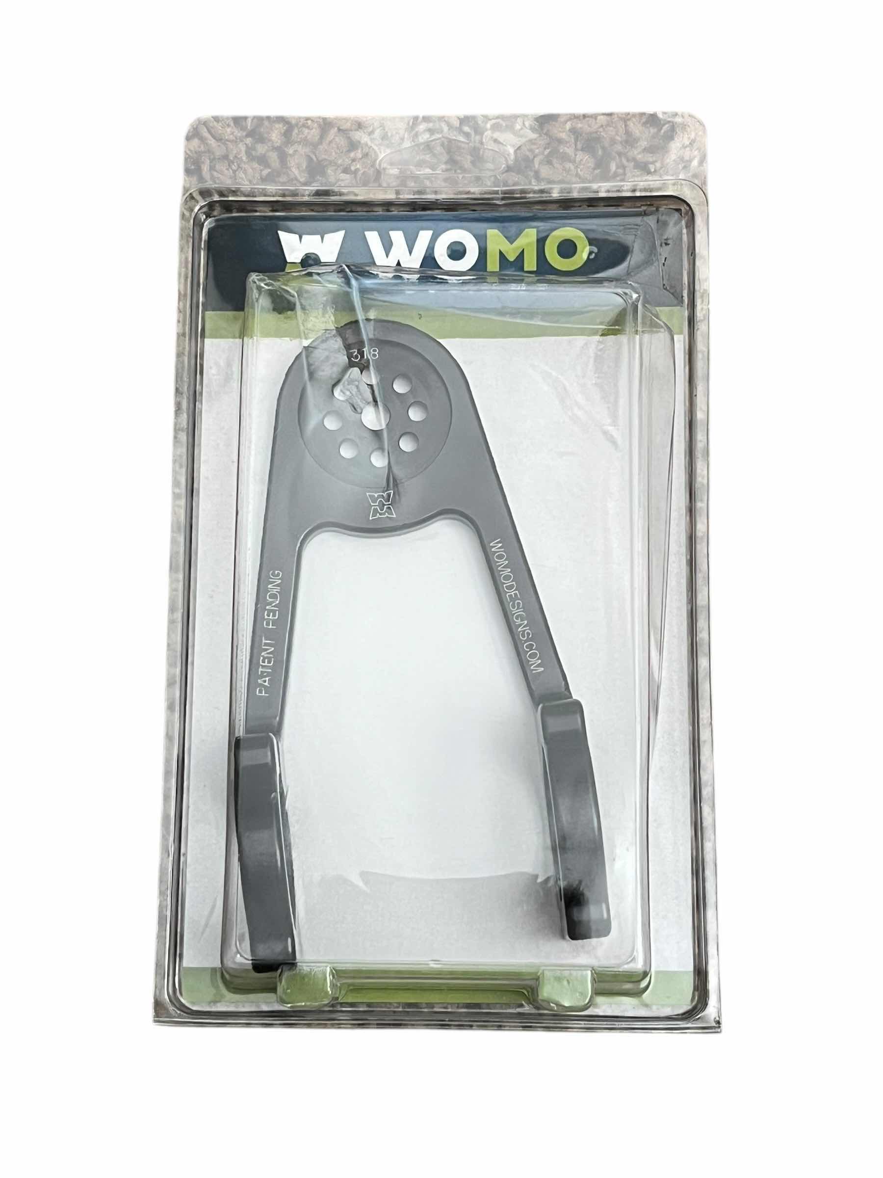 Photo 1 of WOMO DESIGNS 31.8MM UNIVERSAL BICYCLE MOUNT