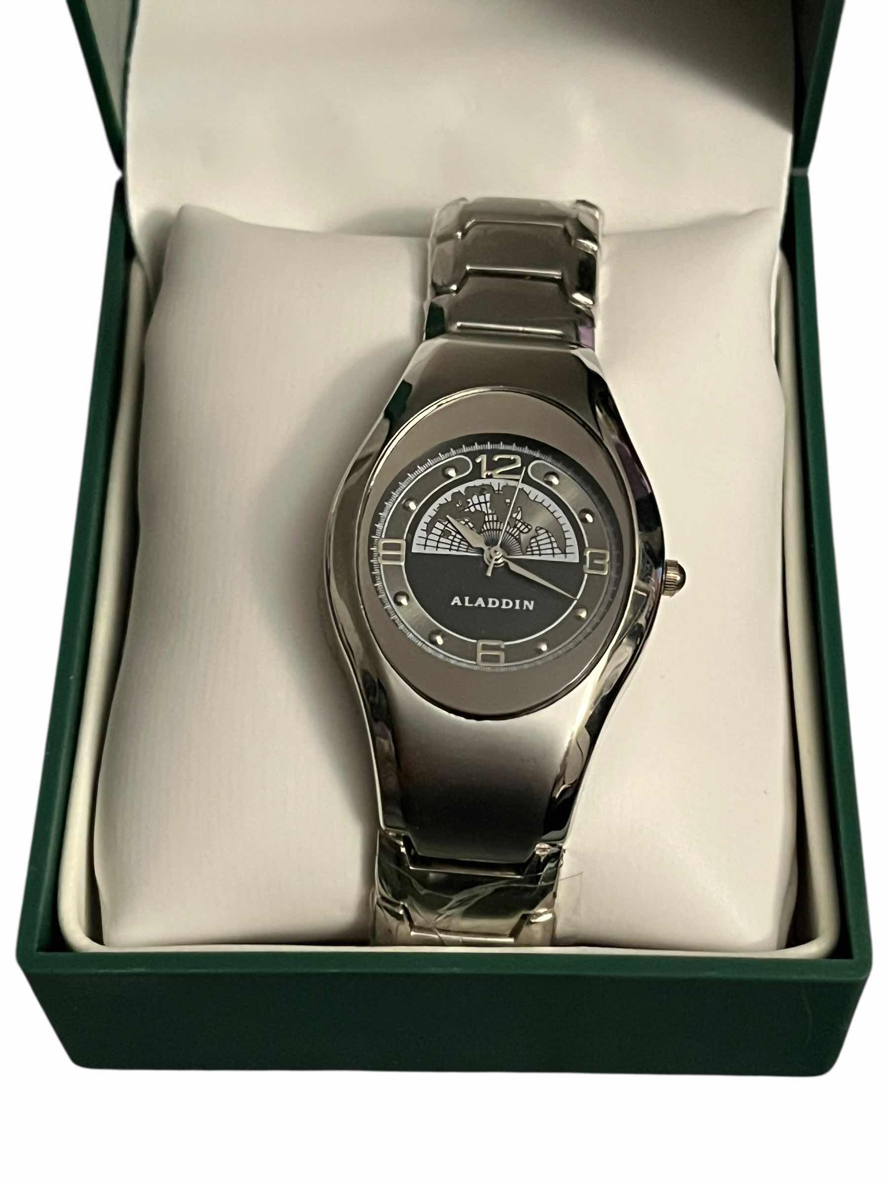 Photo 1 of ALADDIN CASINO LIMITED COLLECTORS EDITION TEAM ALADDIN HIS & HERS SILVERTONE WORLD MAP FACE STAINLESS STEEL LINK WATCHES W CASES