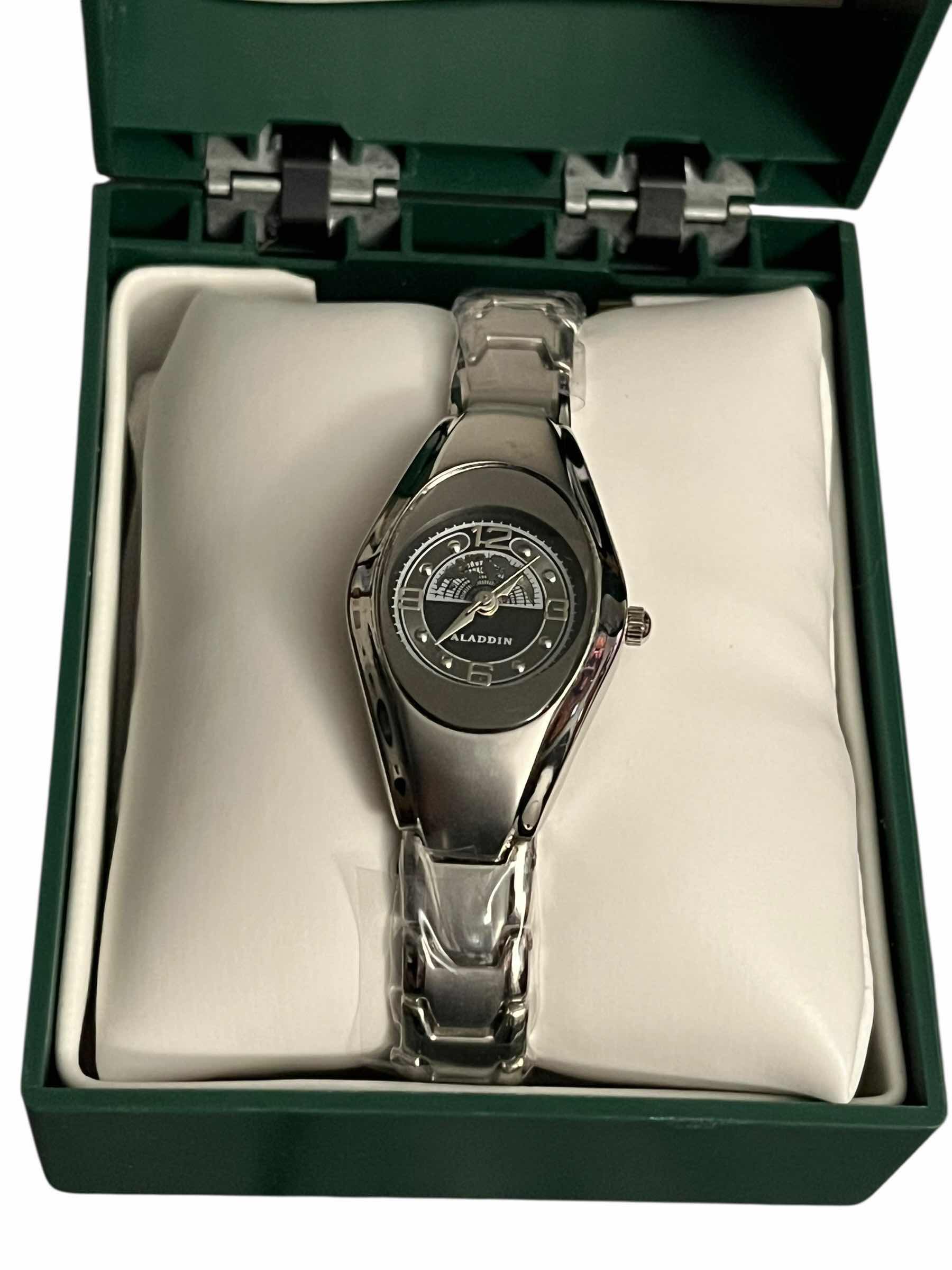 Photo 1 of ALADDIN CASINO LIMITED COLLECTORS EDITION TEAM ALADDIN HIS & HERS SILVERTONE WORLD MAP FACE STAINLESS STEEL LINK WATCHES W CASES