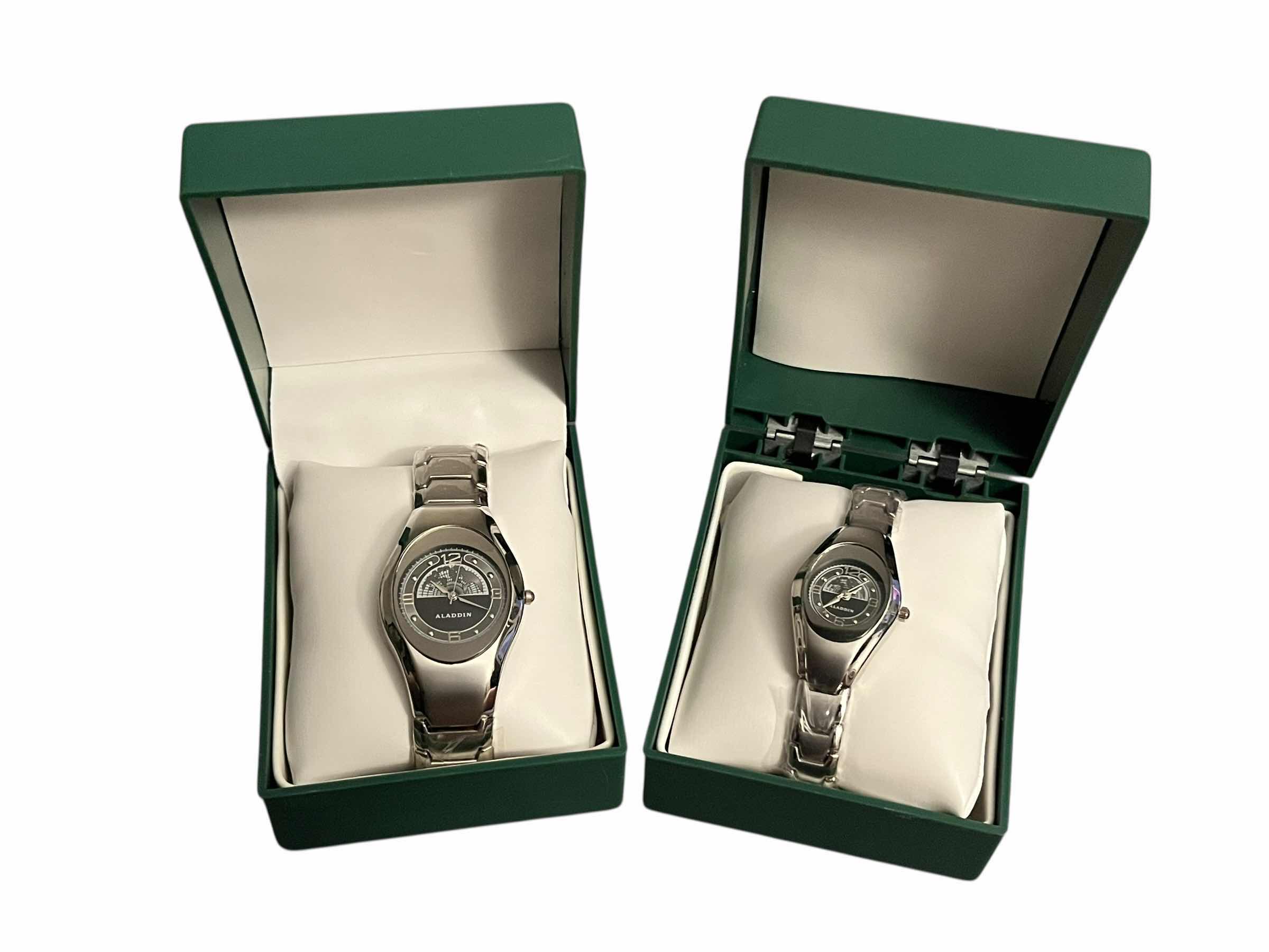 Photo 1 of ALADDIN CASINO LIMITED COLLECTORS EDITION TEAM ALADDIN HIS & HERS SILVERTONE WORLD MAP FACE STAINLESS STEEL LINK WATCHES W CASES