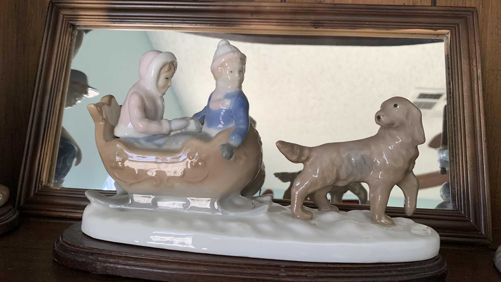 Photo 1 of PAUL SEBASTIAN PORCELAIN STATUES BASEBALL TALLEST IS 9”