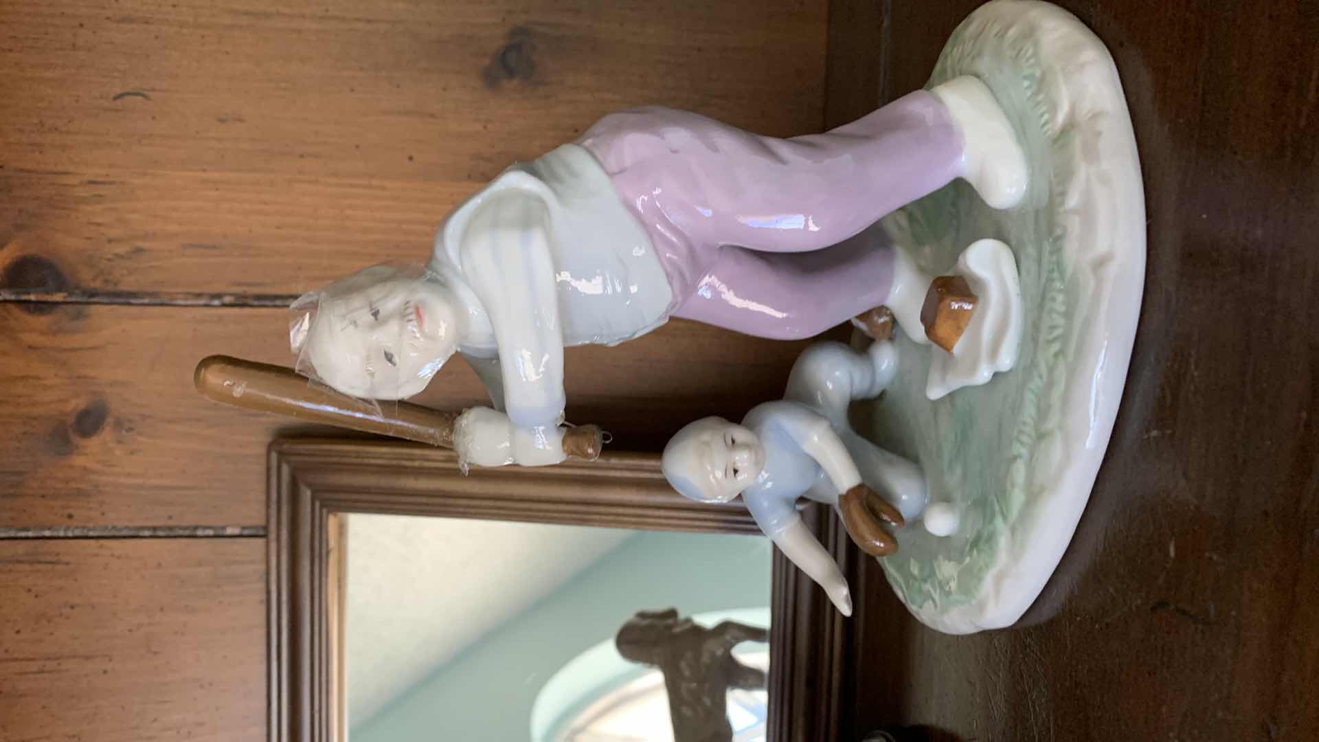 Photo 1 of PAUL SEBASTIAN PORCELAIN STATUES BASEBALL TALLEST IS 9”