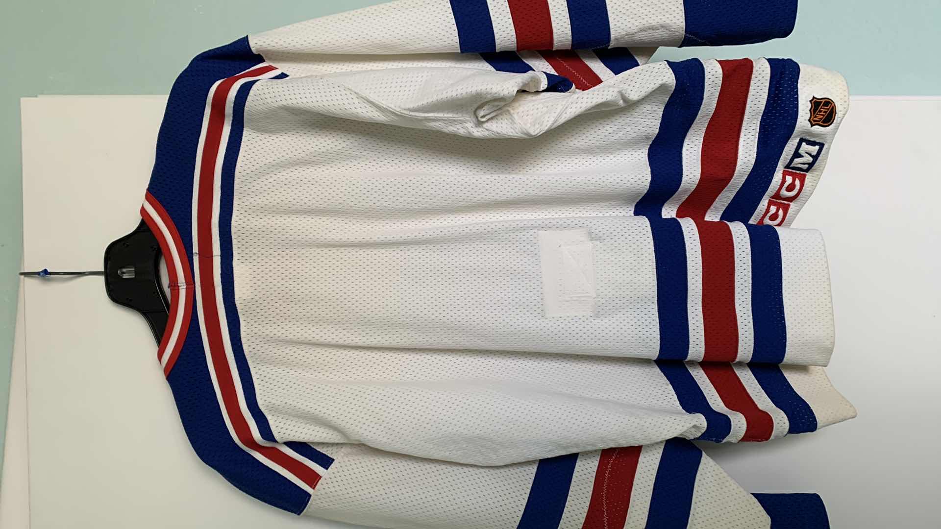 Photo 1 of CCM NEW YORK RANGERS JERSEY SIZE 46