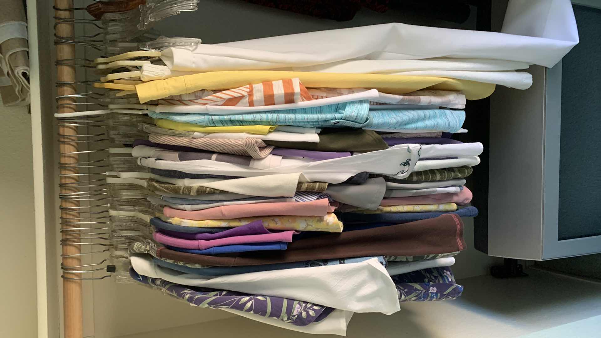 Photo 1 of CONTENTS OF CLOSET WOMEN’S SIZE MEDIUM AND LARGE