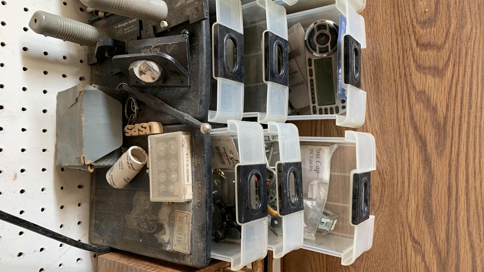 Photo 1 of CONTAINERS WITH HOUSE REPAIR ITEMS, GLASS CUTTERS, SHARPENING STONES